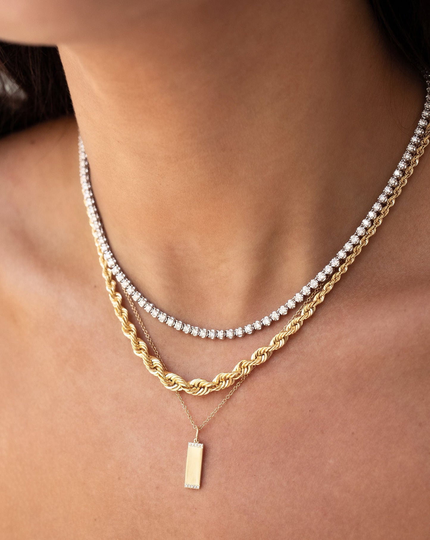 cupcake set diamond tennis necklace, gold rope chain necklace, diamond border gold tag pendant necklace on model