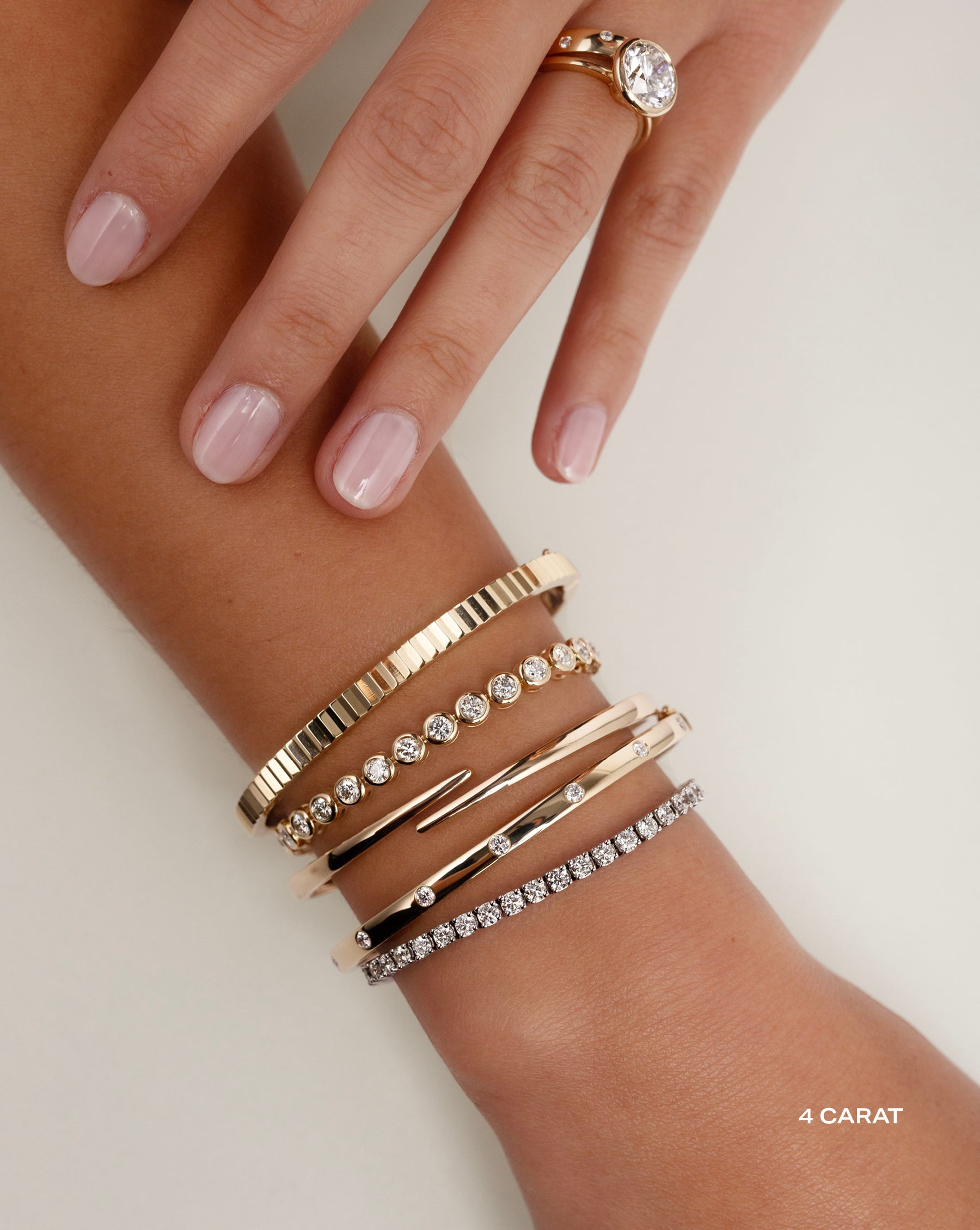 Classic Diamond Tennis Bracelet styled with 4 other Ring Concierge bracelets