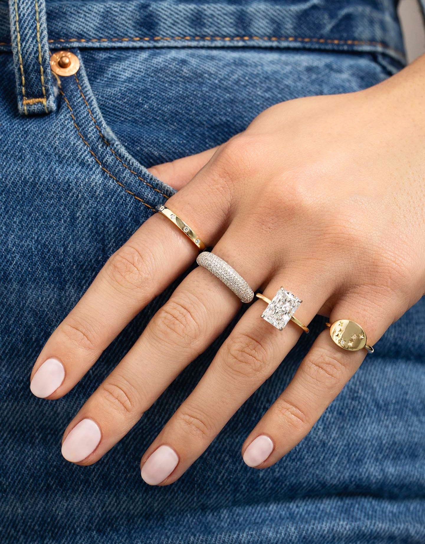 Inlay Diamond Ring on pointer finger on model