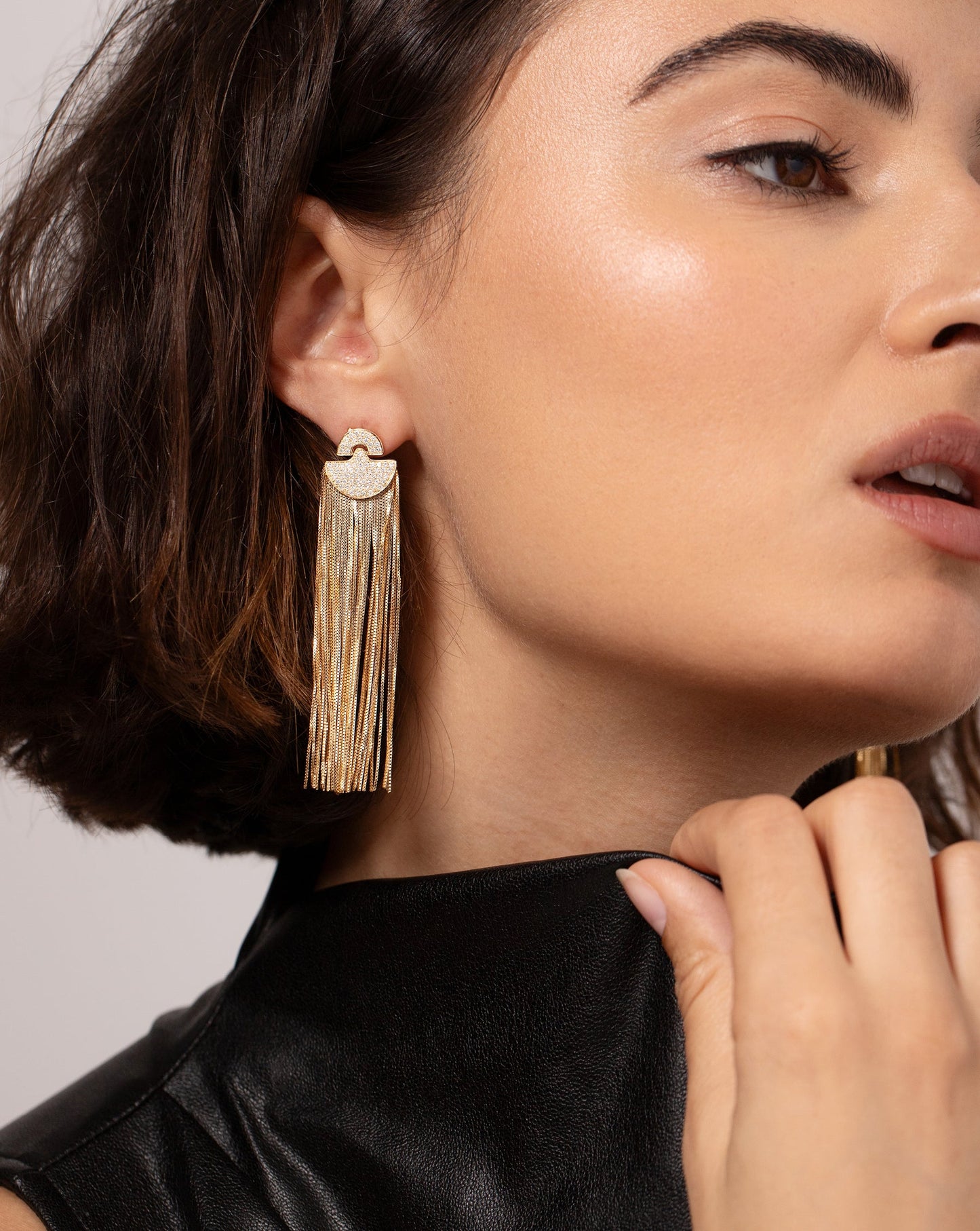 Art Deco Waterfall Earrings modeled on ear 