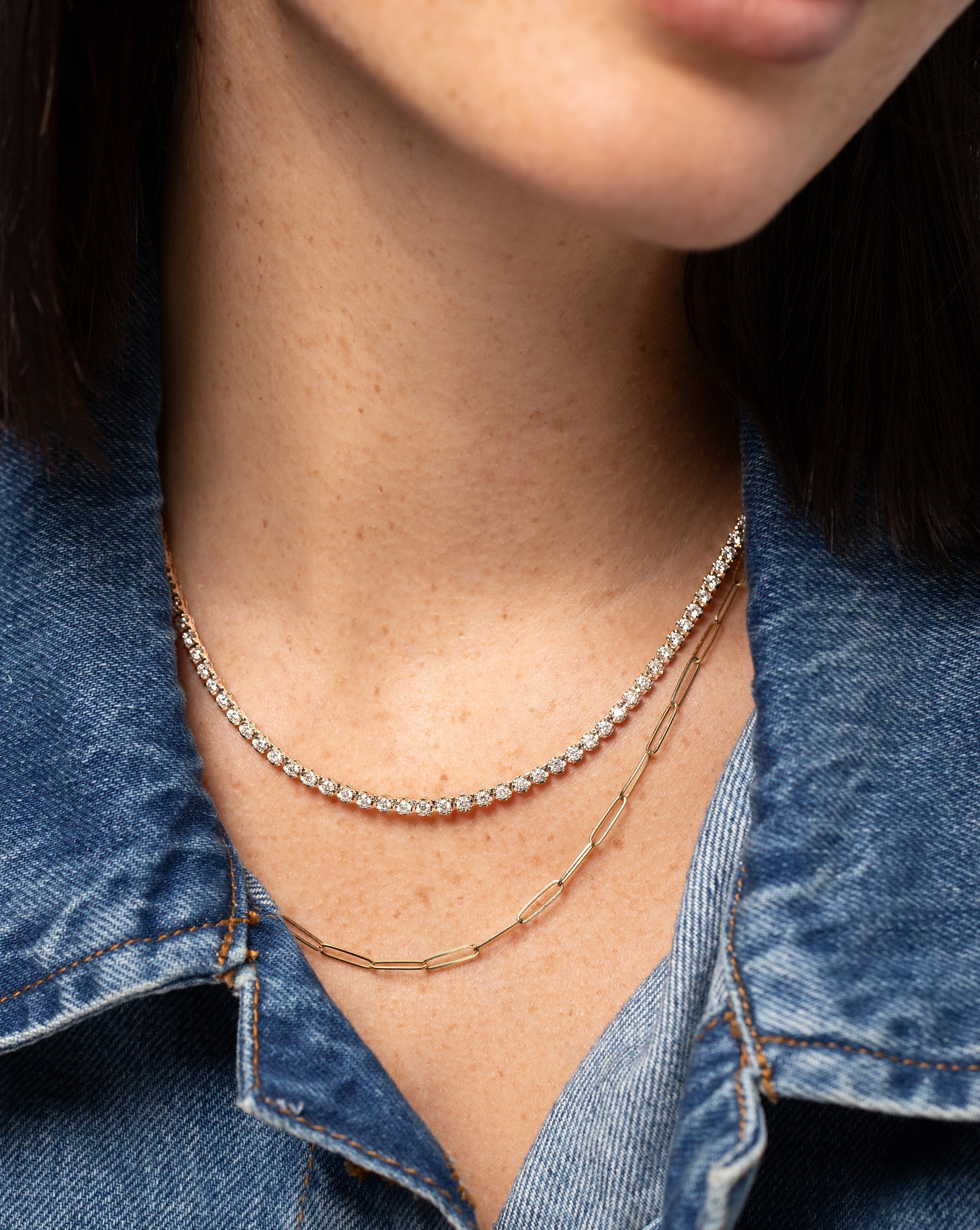 14k yellow gold small link necklace and cupcake set diamond tennis necklace shown on model