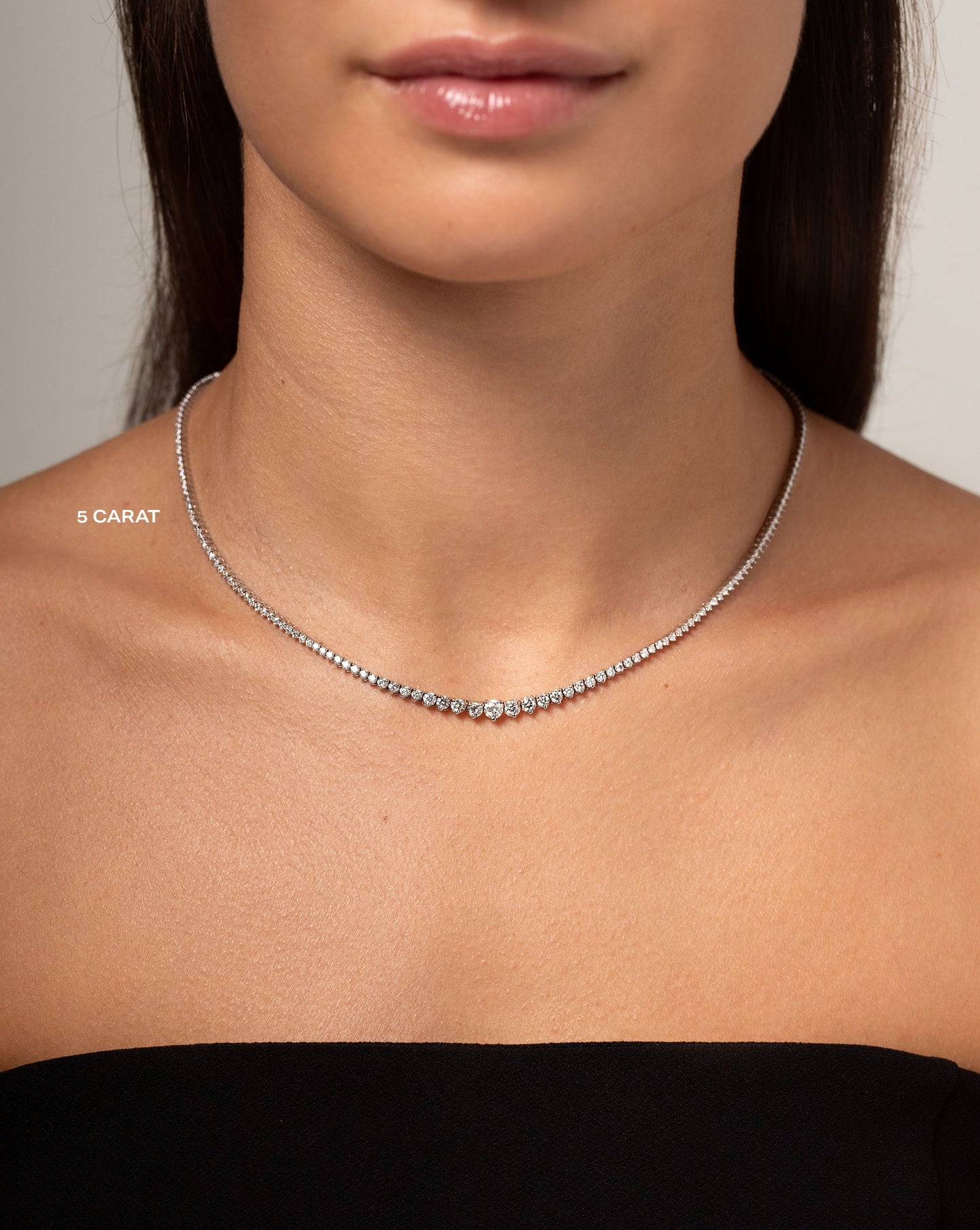 5 ct Graduated Diamond Tennis Necklace shown on neck of model