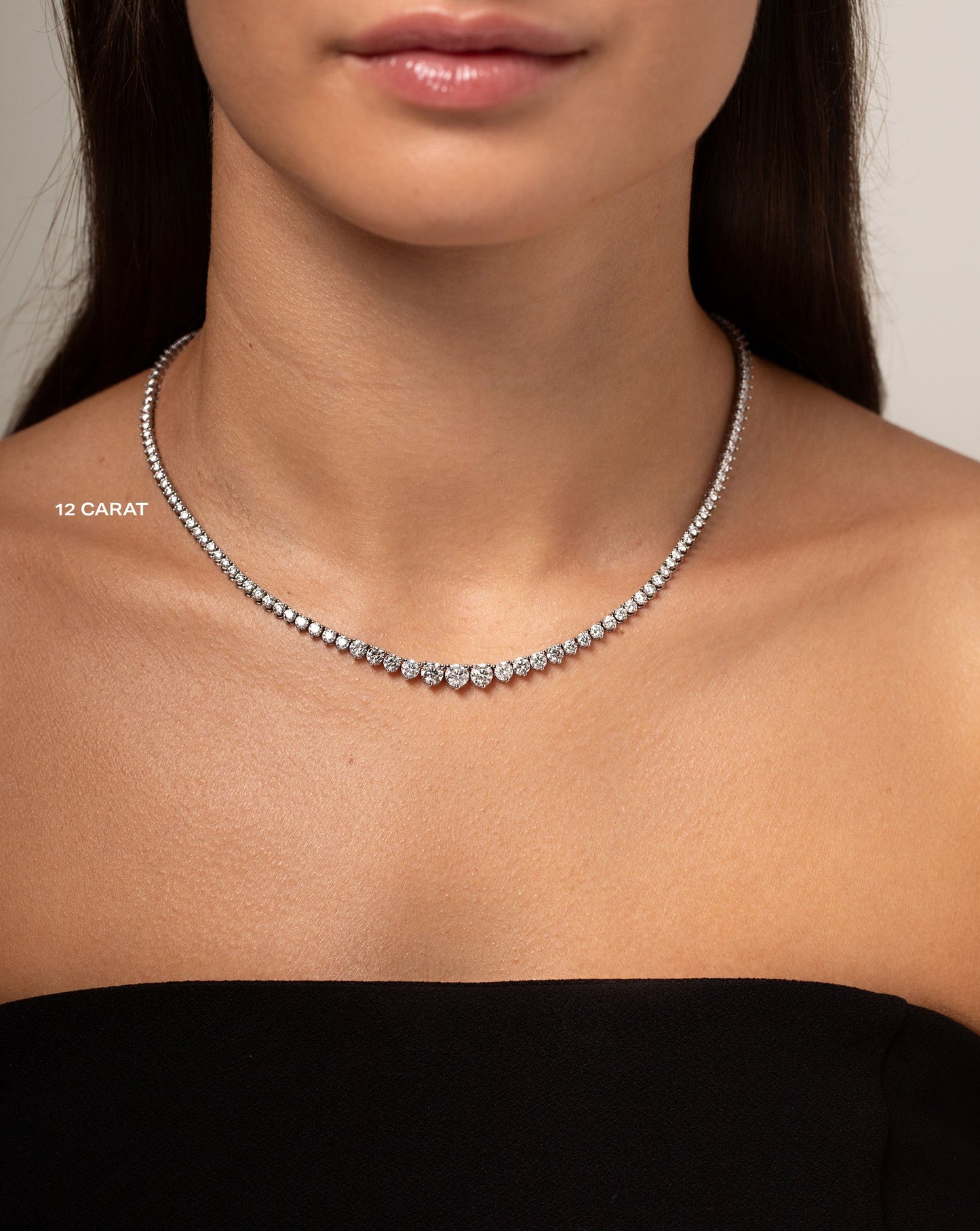 12 ct Graduated Diamond Tennis Necklace shown on neck of model