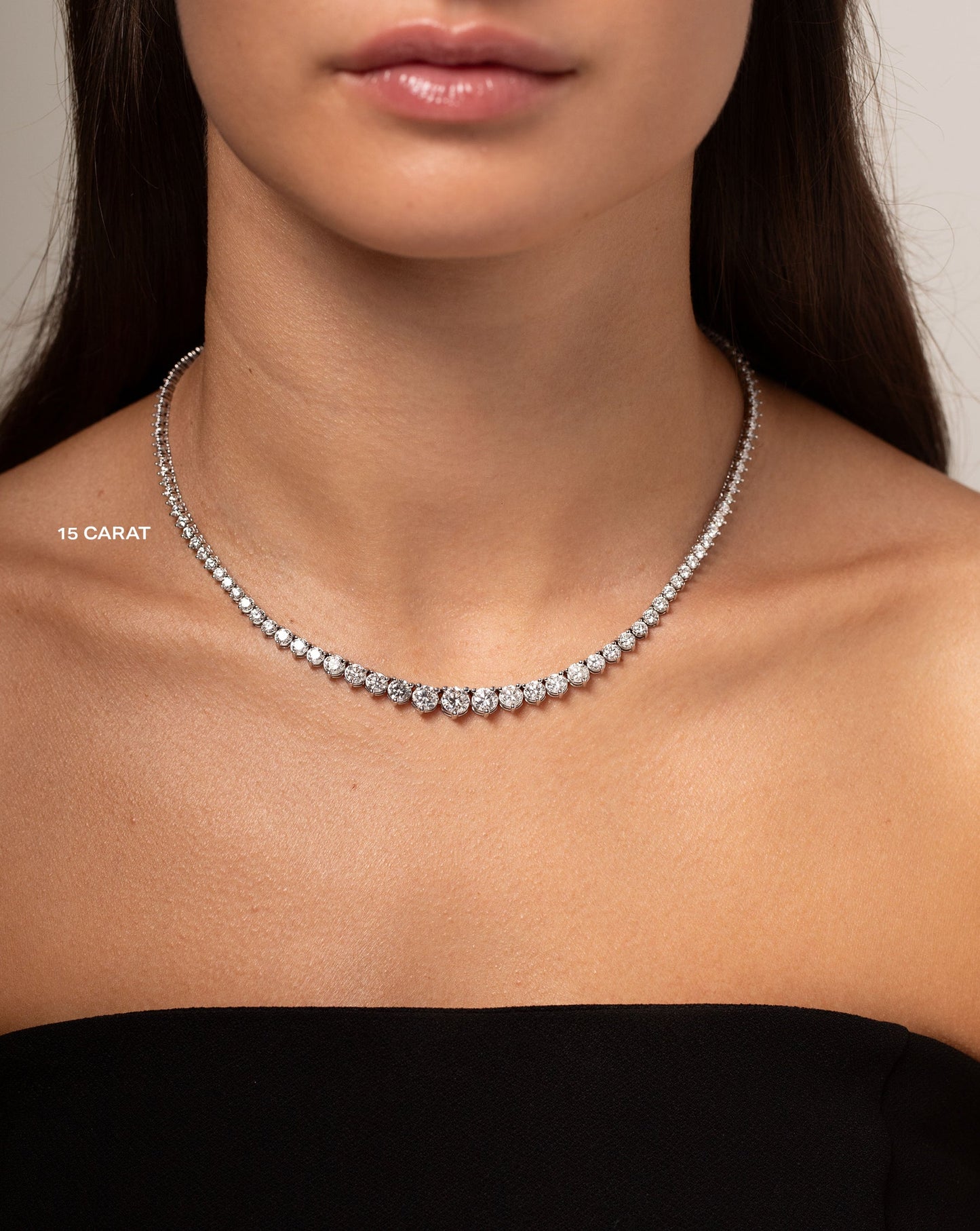 15 ct Graduated Diamond Tennis Necklace shown on neck of model