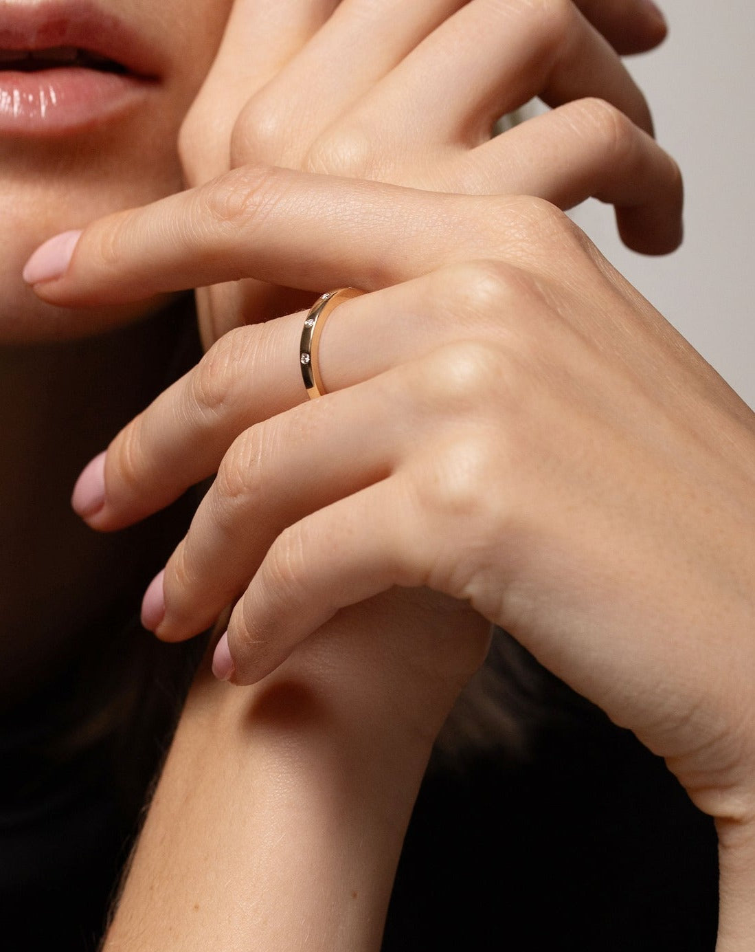 Model wearing Inlay Diamond Ring and Jumbo Gold Bead Bracelet