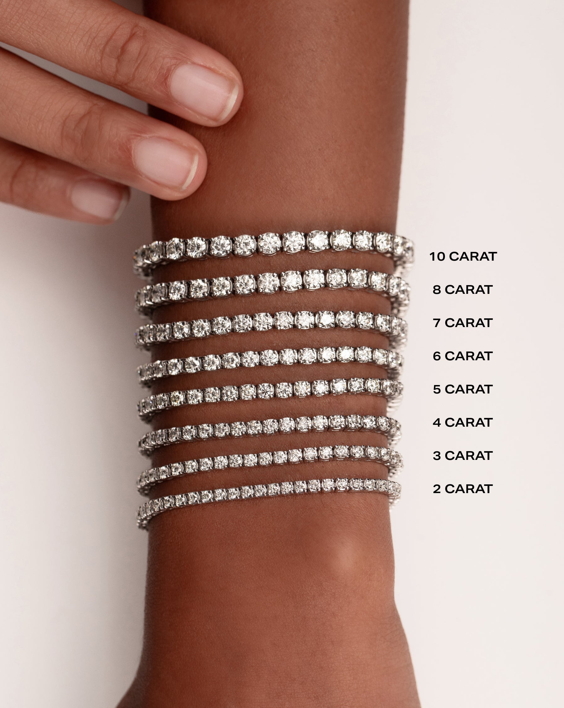 Classic diamond tennis bracelet on model showing all eight carat weight options ranging from 2 carat to 10 carat
