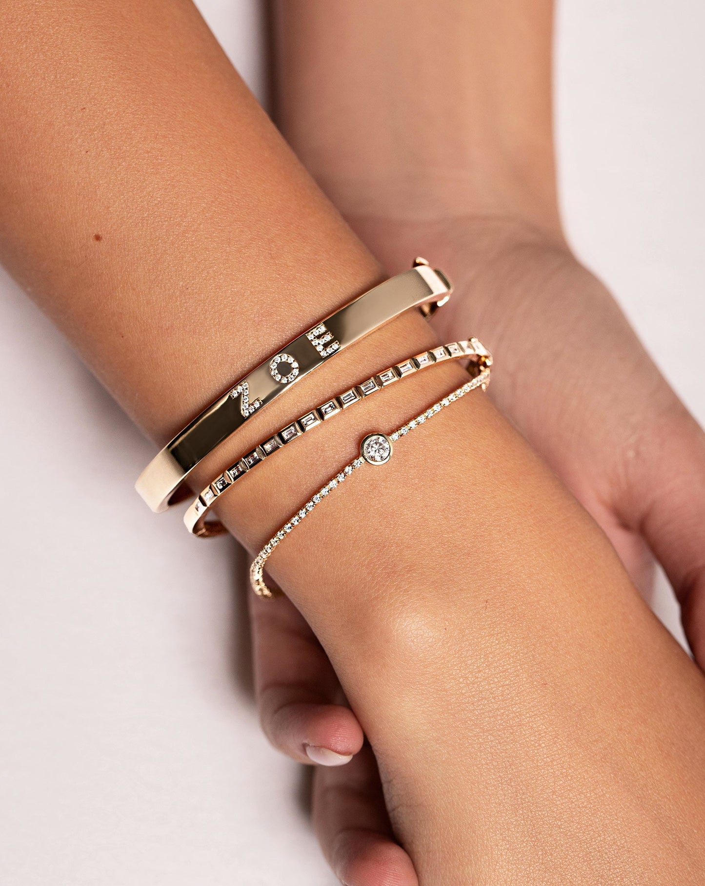 Ring Concierge Bracelets Baguette Bezel Bangle in 14K Yellow Gold styled with two additional RC bracelets