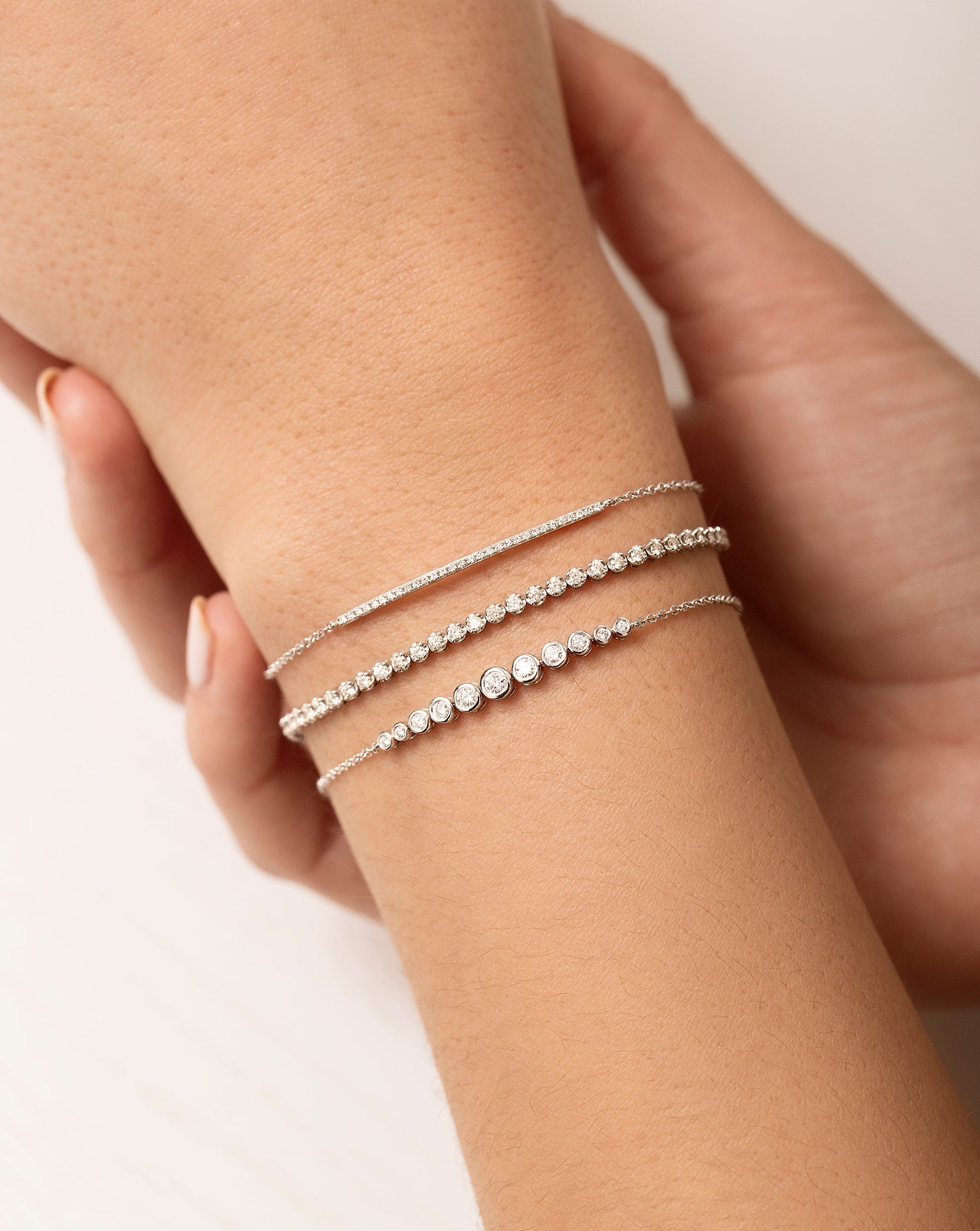 Mini Diamond Tennis Bracelet on model styles with graduated diamond bezel soft chain bracelet and diamond bar bracelet