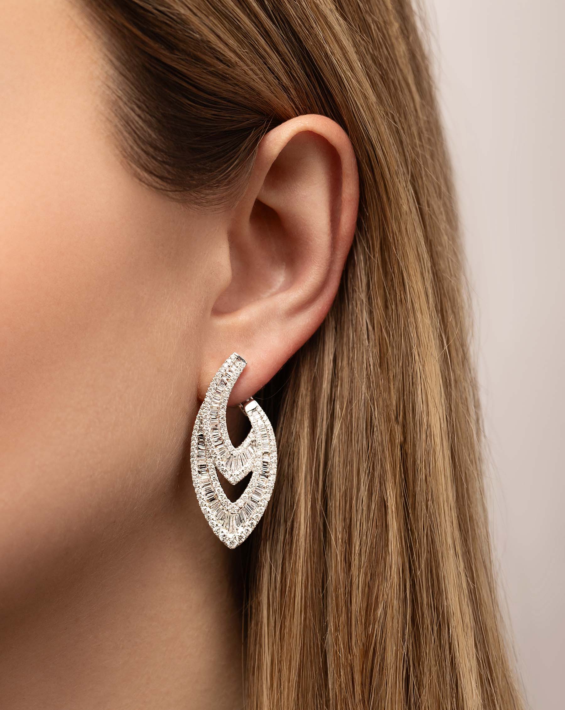 Art Deco Earrings on model
