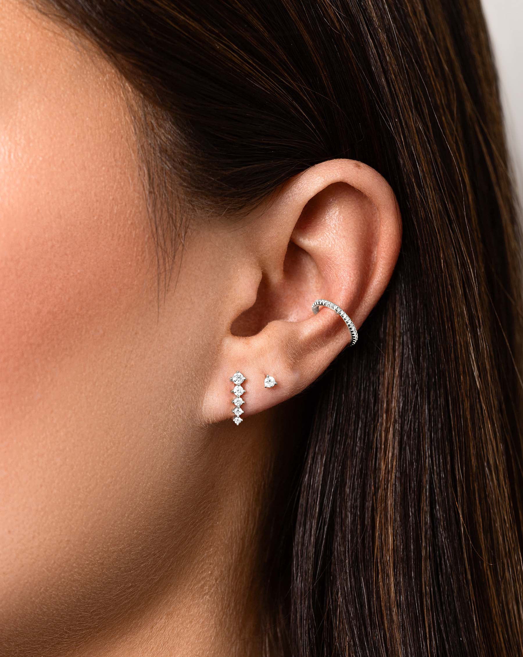 Diamond Ear Cuff in white gold styled with 2 studs on model