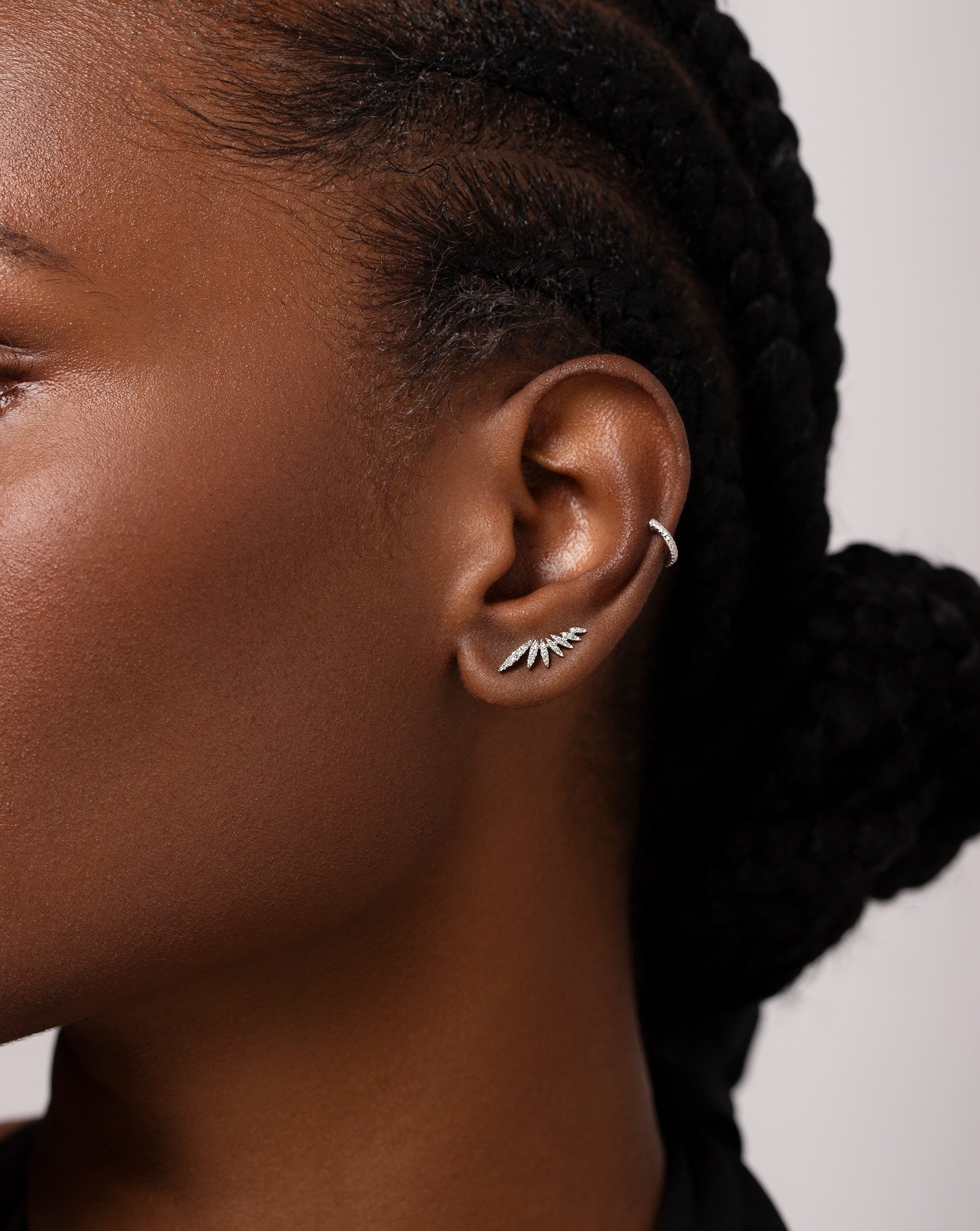 Mini Diamond Ear Cuff in White Gold on model styled with 1 other Ring Concierge earring