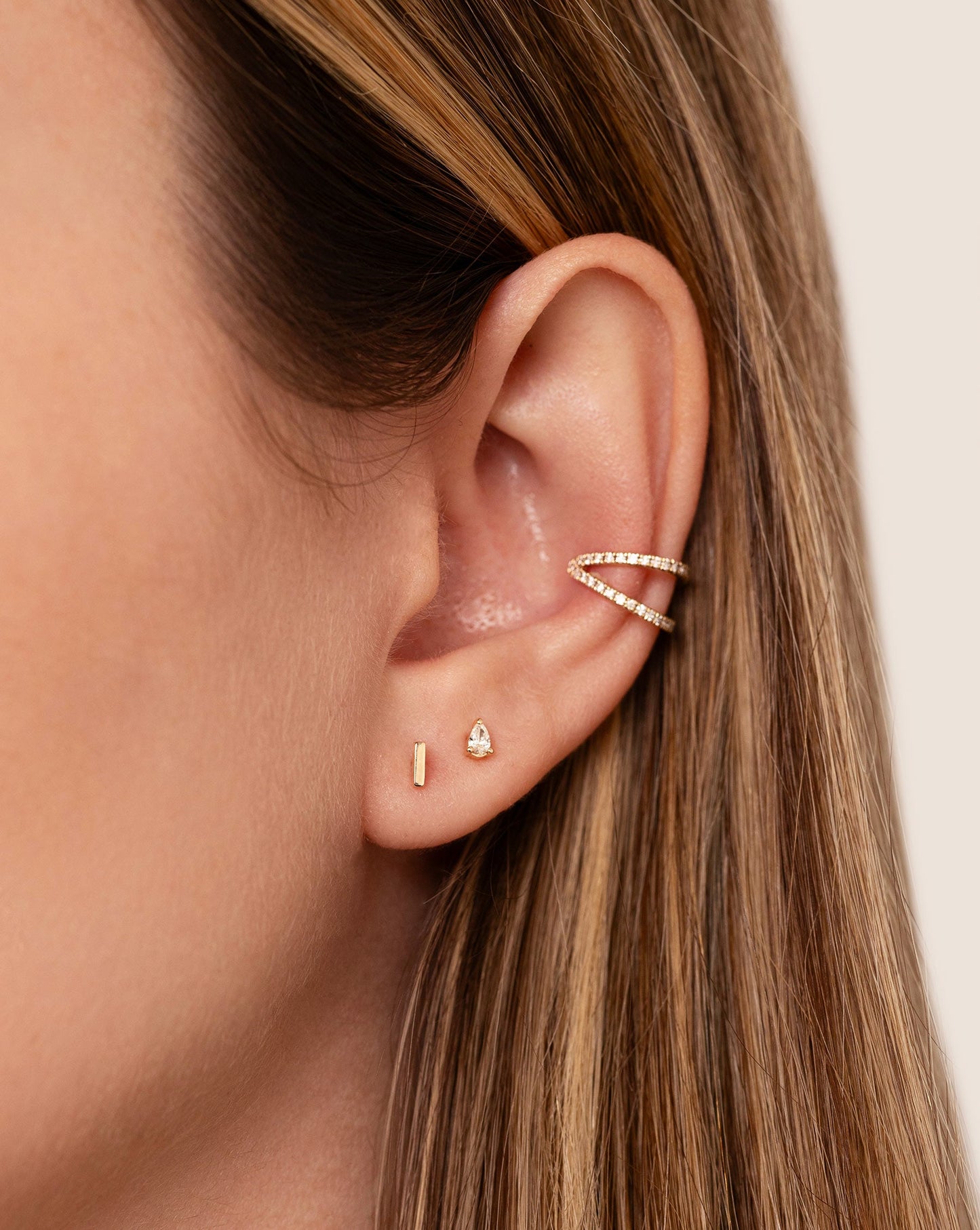Double Row Diamond Ear Cuff on model styled with 2 studs