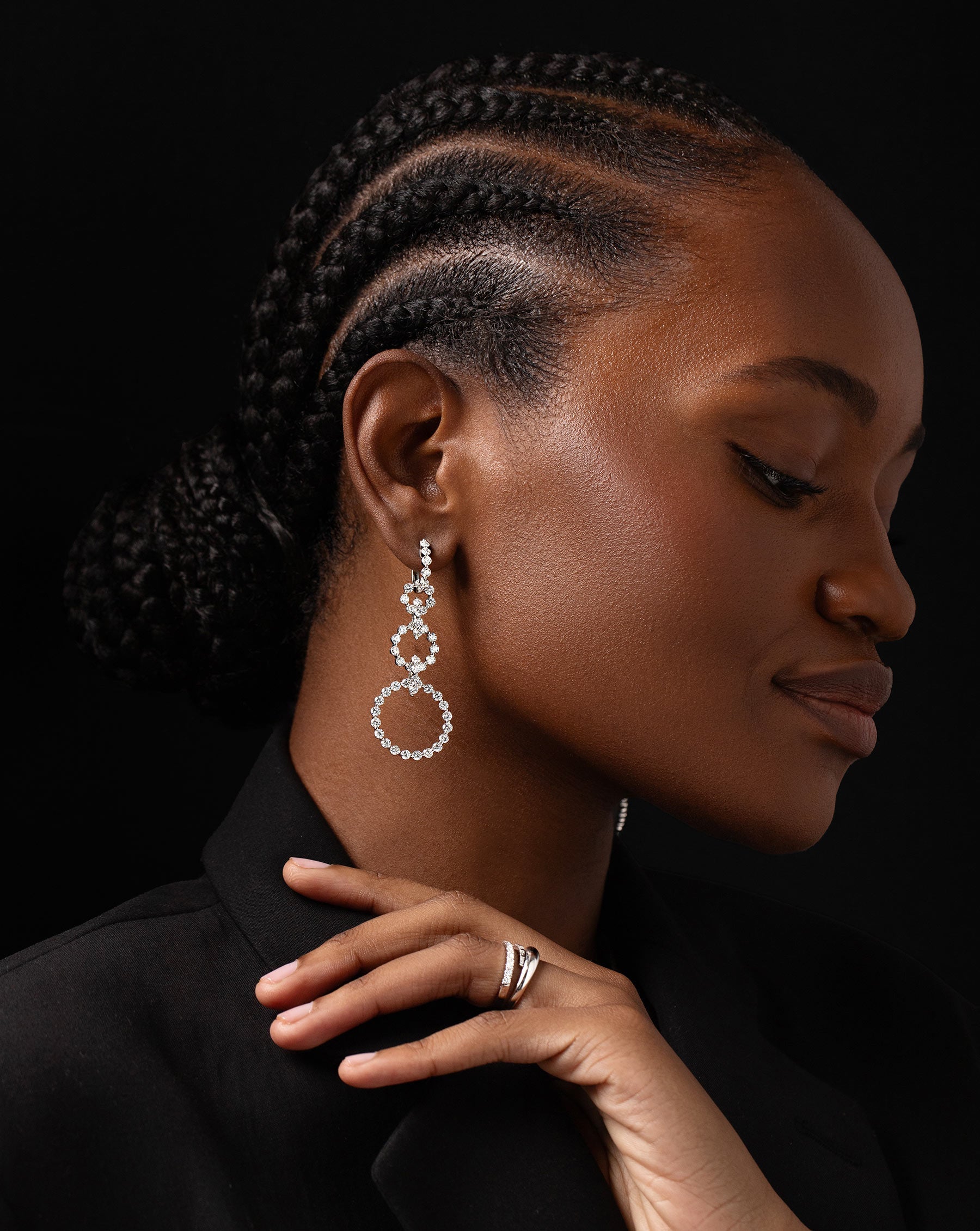 diamond statement earrings featuring three graduated circle drop hoops shown on model