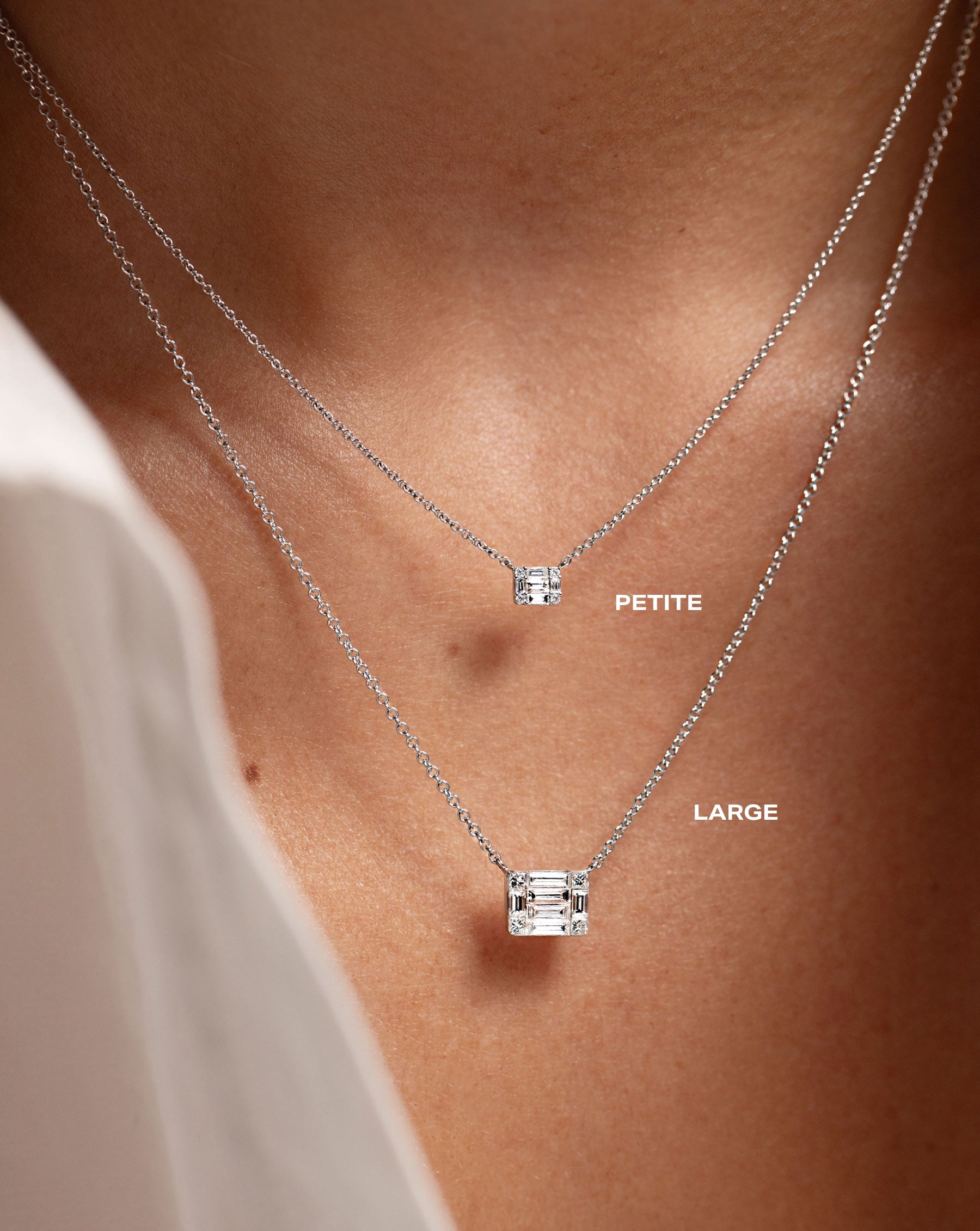 on model comparison of large emerald illusion pendant necklace and petite emerald illusion pendant necklace
