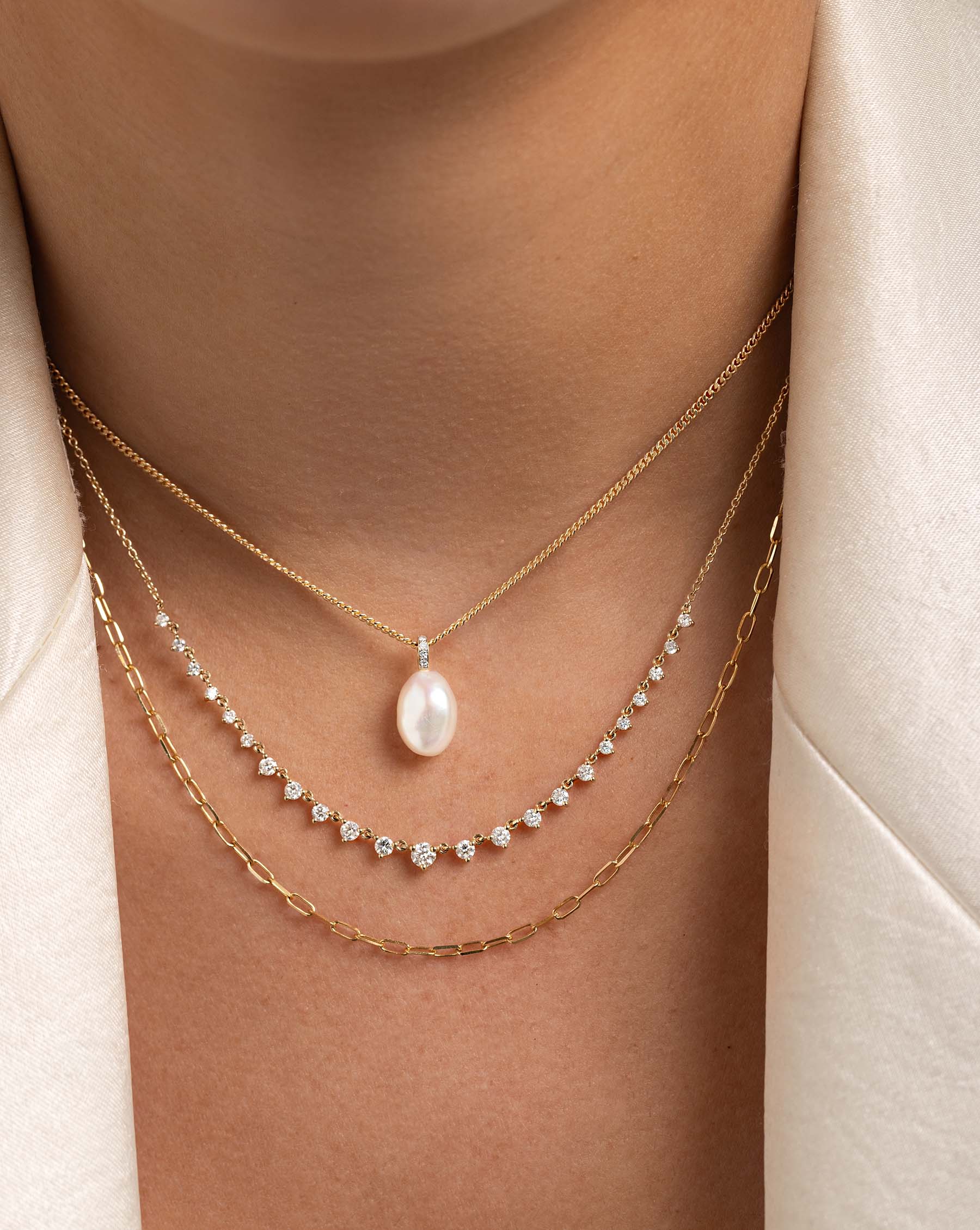 Graduated Diamond Layering Necklace styled with Organic Pearl choker and multiway mini link necklace on model