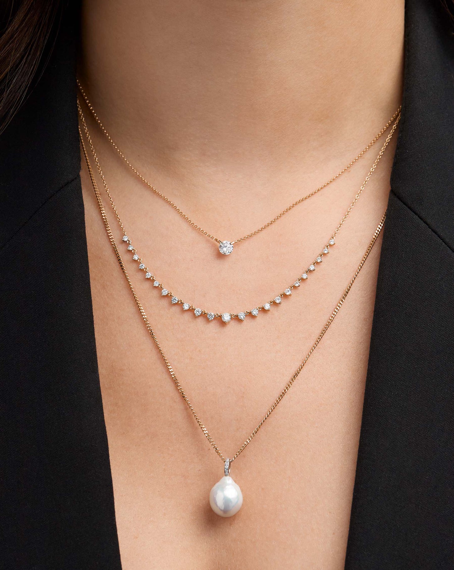 Organic Pearl + Pavé Layering Necklace styled with diamond pendant necklace and floating diamond layering necklace on model