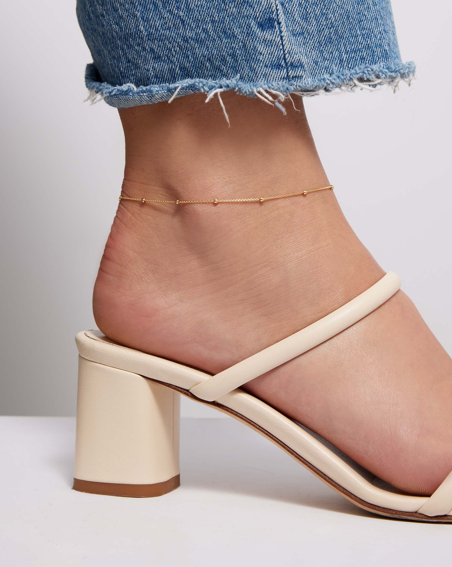 Saturn Chain Anklet on model wearing block heel sandal
