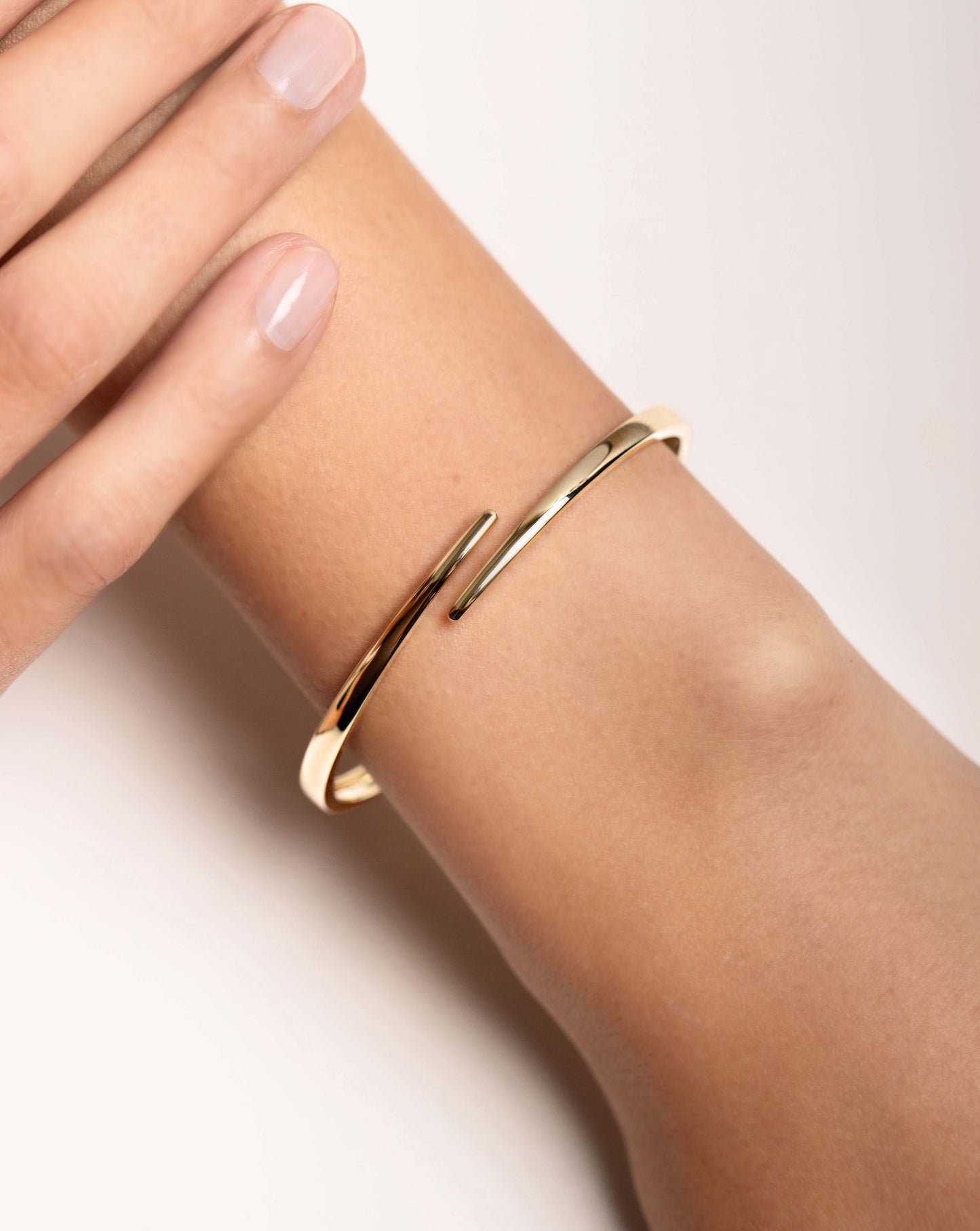 Open Wrap Gold Bangle on model