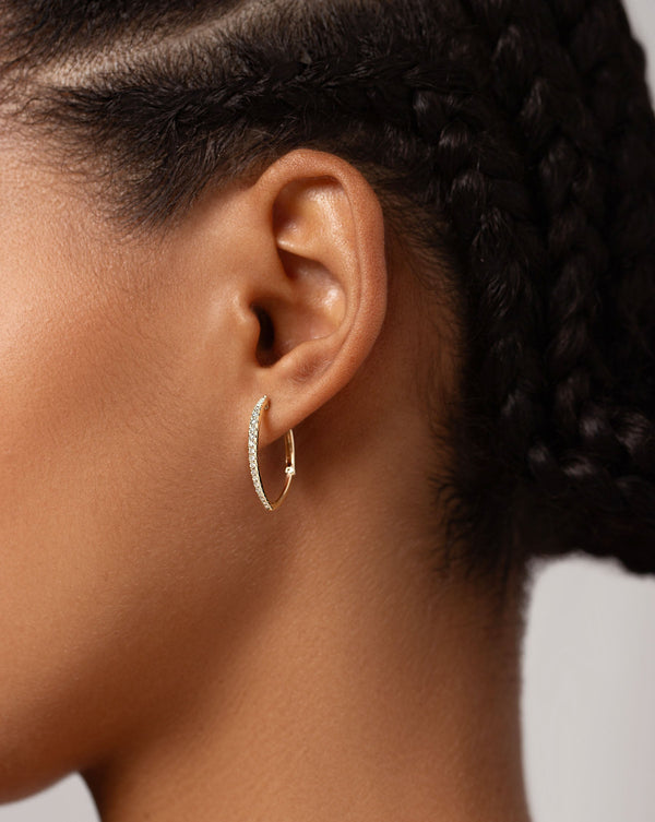 Graduated Marquise Diamond Hoops on model