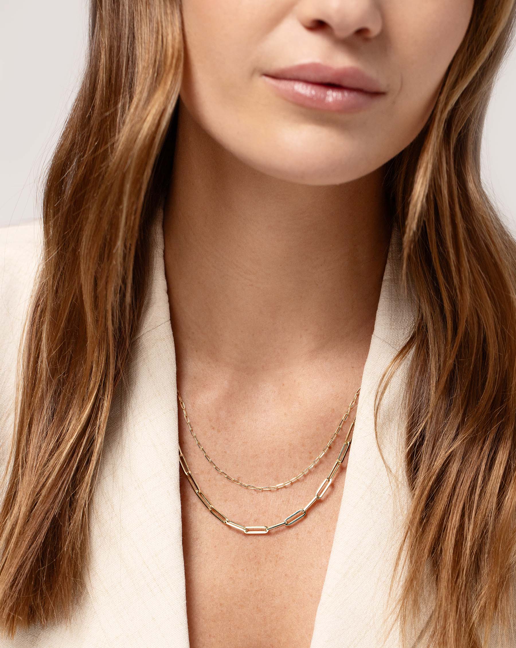 Multiway Mini Link Necklace + Triple Wrap Bracelet and Multiway Jumbo Link Necklace + Triple Wrap Bracelet on model as necklaces