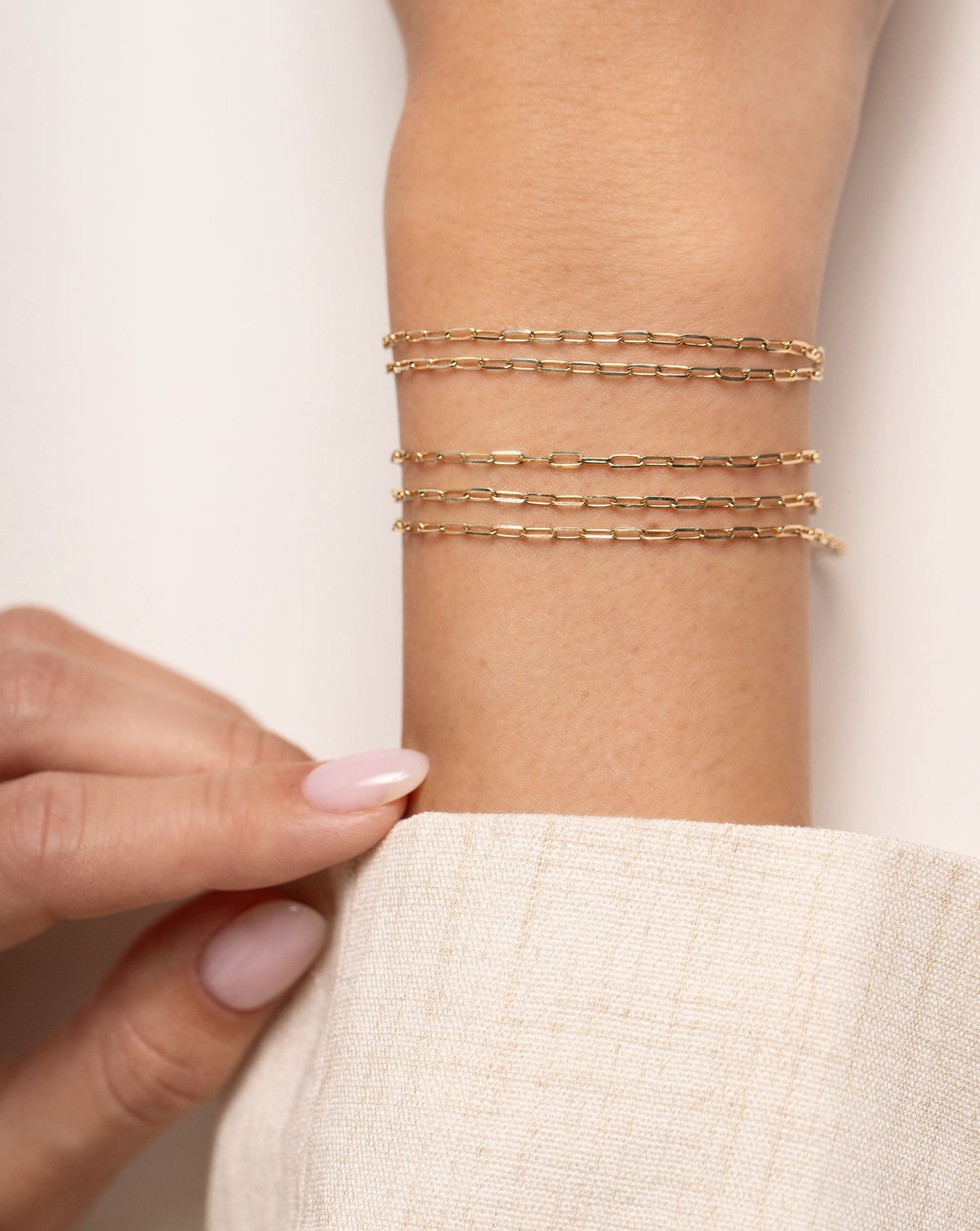 Multiway Mini Link Necklace + Triple Wrap Bracelet and Multiway Jumbo Link Necklace + Triple Wrap Bracelet on model as bracelets