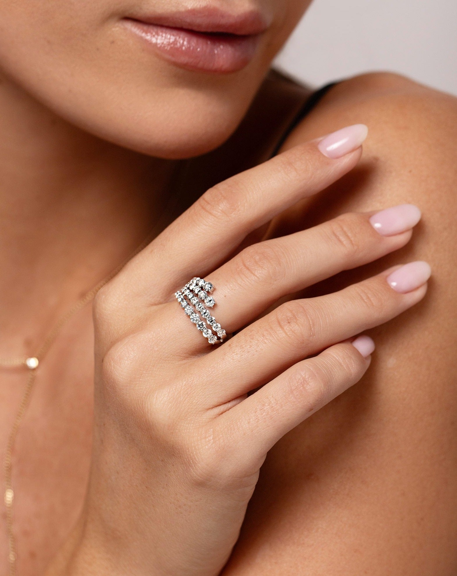 Fanned Diamond Statement Ring shown on middle finger of model