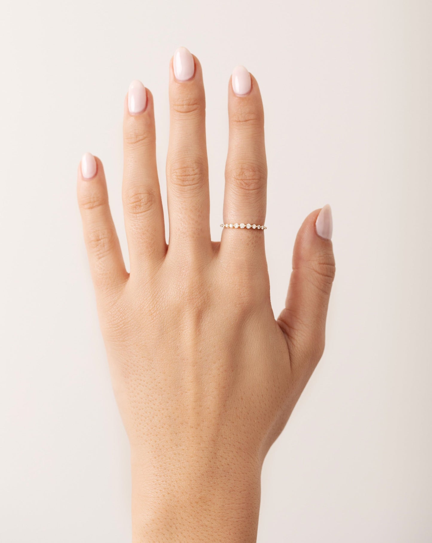 Graduated Single Prong Diamond Ring