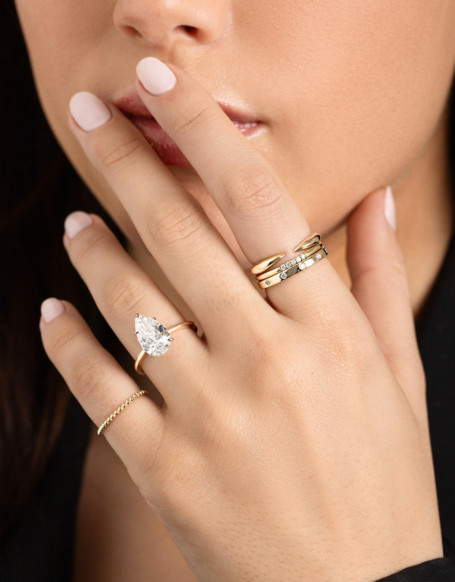 Inlay Diamond Ring stacked with 2 other rings on model