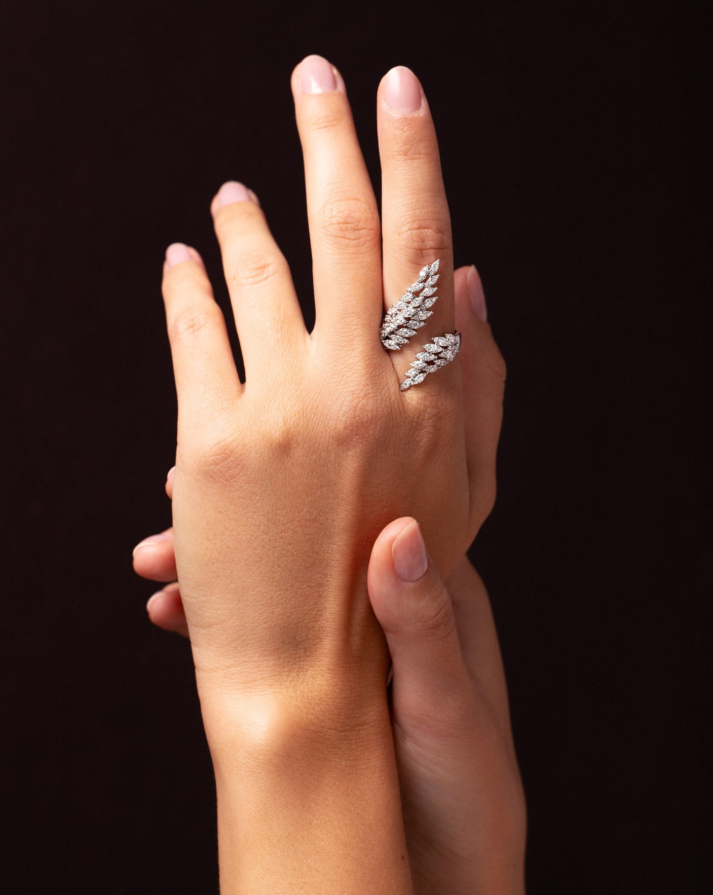 Marquise Illusion Diamond Wrap Ring worn on pointer finger of hand