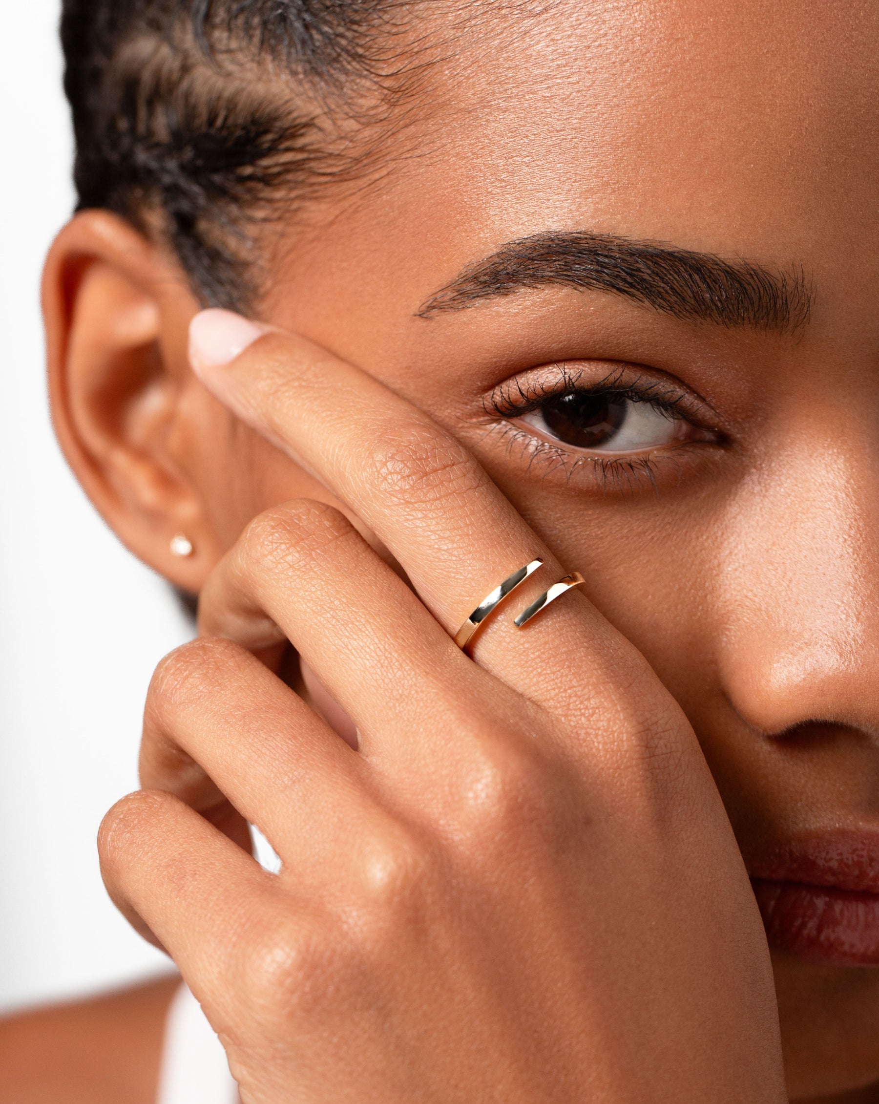 14k yellow gold open wrap ring on model