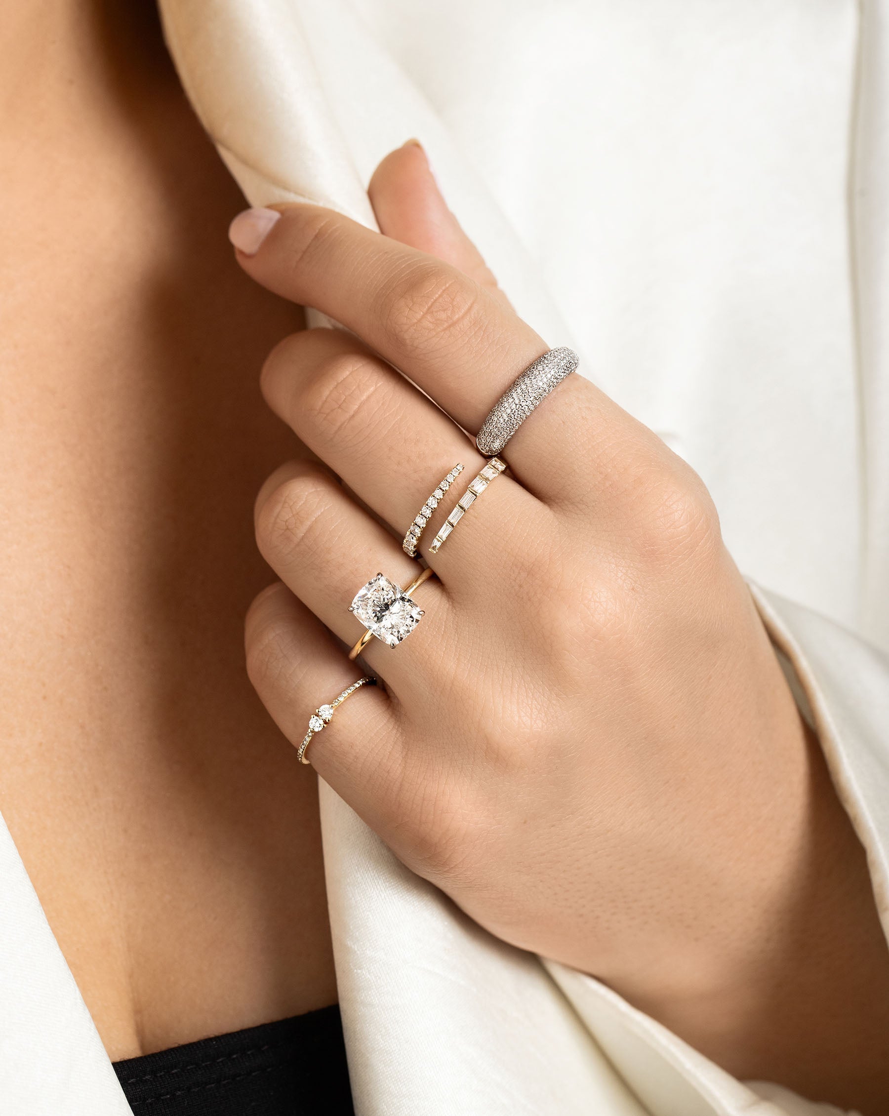 Twin Diamond Ring on pinky finger on model