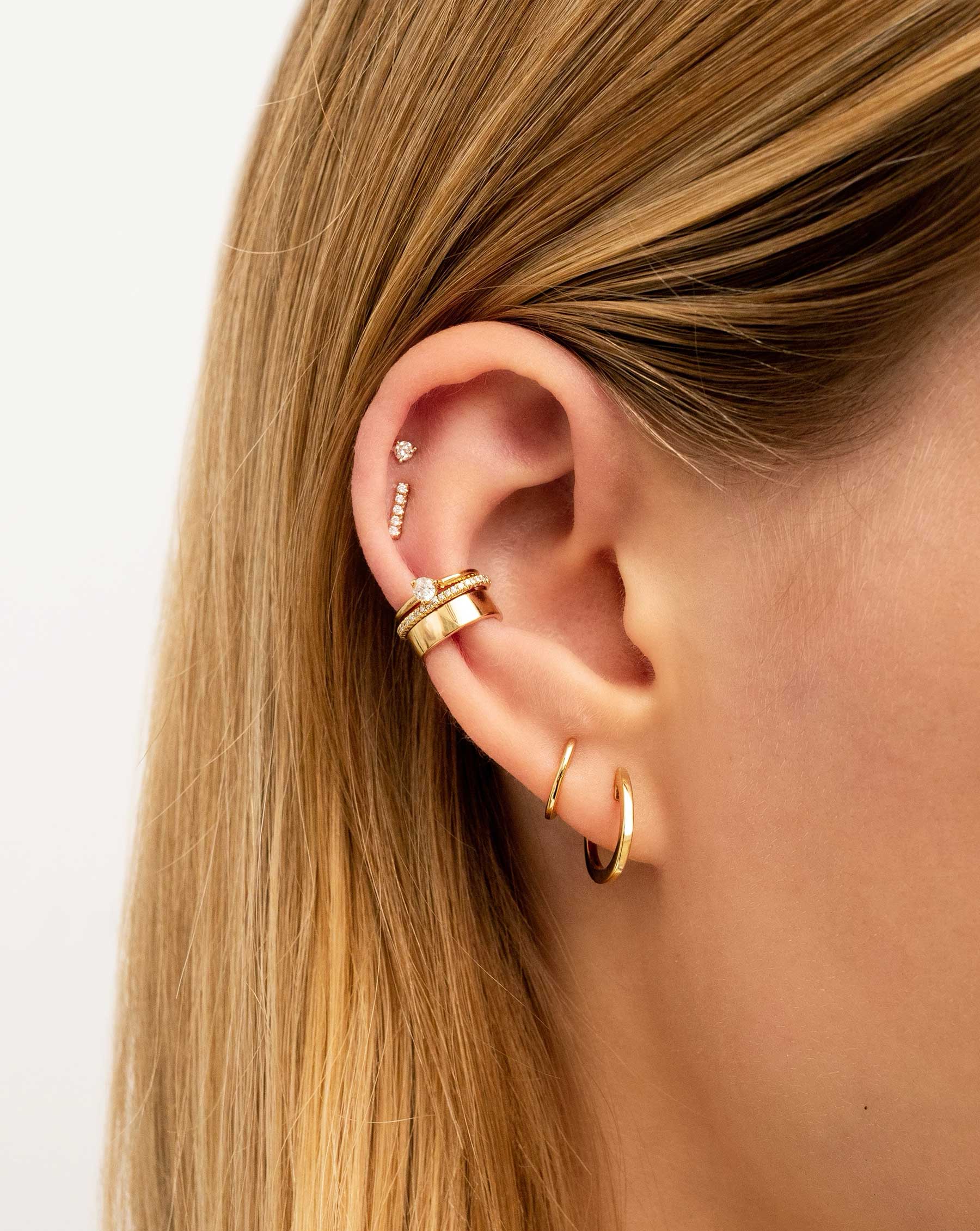 Ring Concierge Earrings 14k Yellow Gold Diamond Ear Cuff - styled on ear with hoops and studs