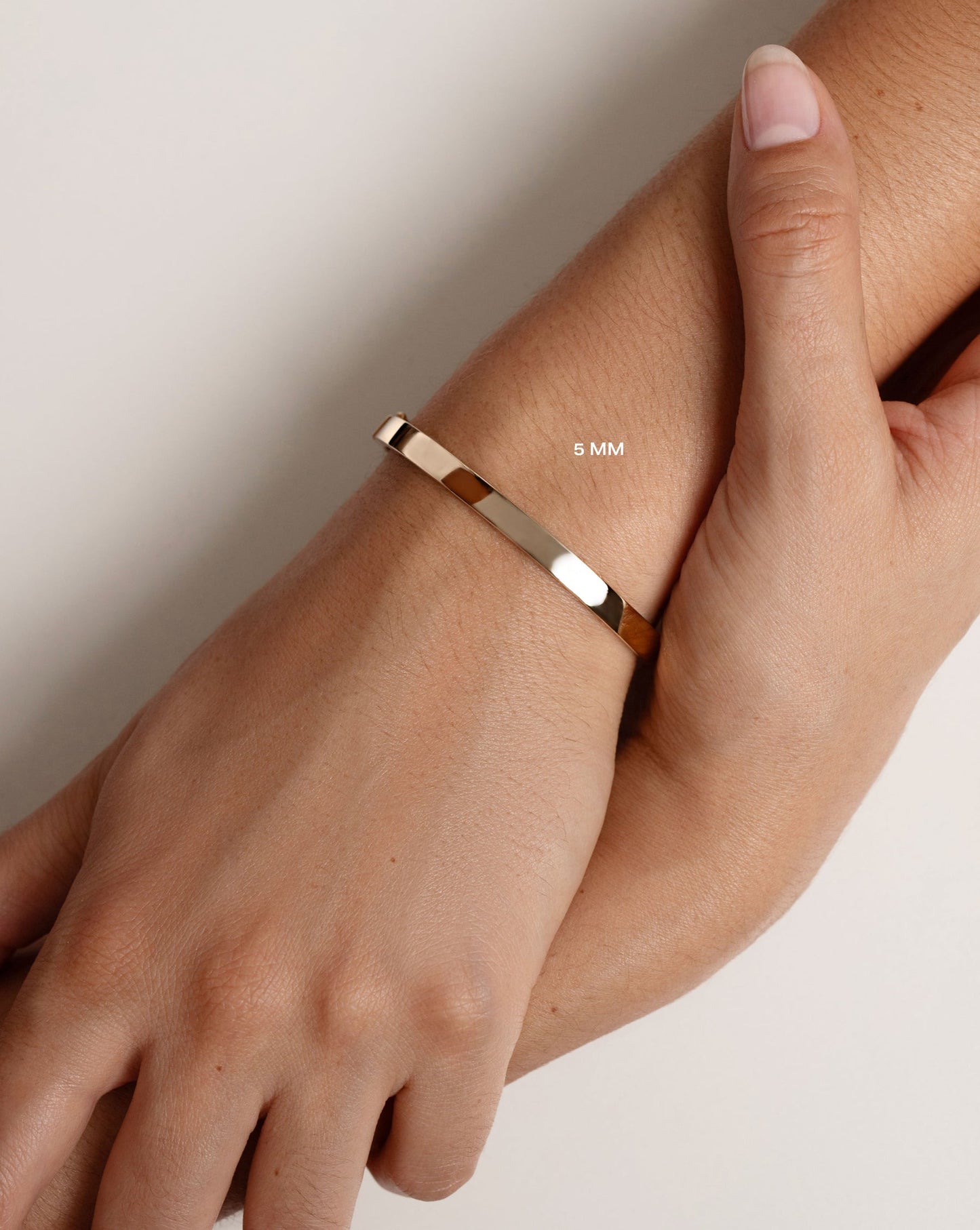 5 mm Stackable Gold Bangle on wrist