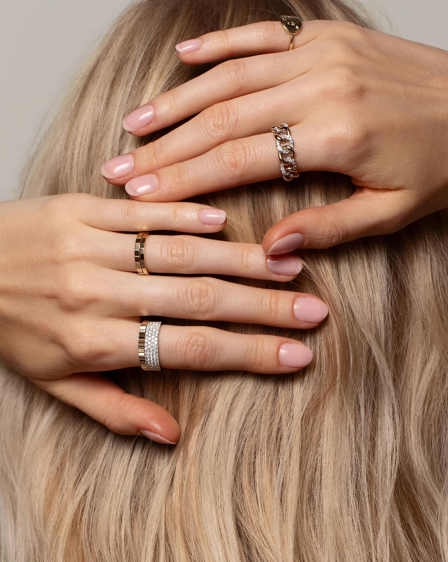 Diamond Chain Ring worn on hand along with the Zodiac Constellation Signet Ring, Geometric Stackable Ring, Faceted Stackable Ring, Fluted Stackable Ring and the Four Row Stackable Pave Diamond Ring