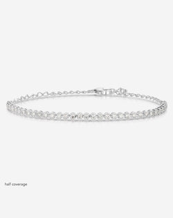 flat lay of 14k white gold half coverage Mini Diamond Tennis Bracelet