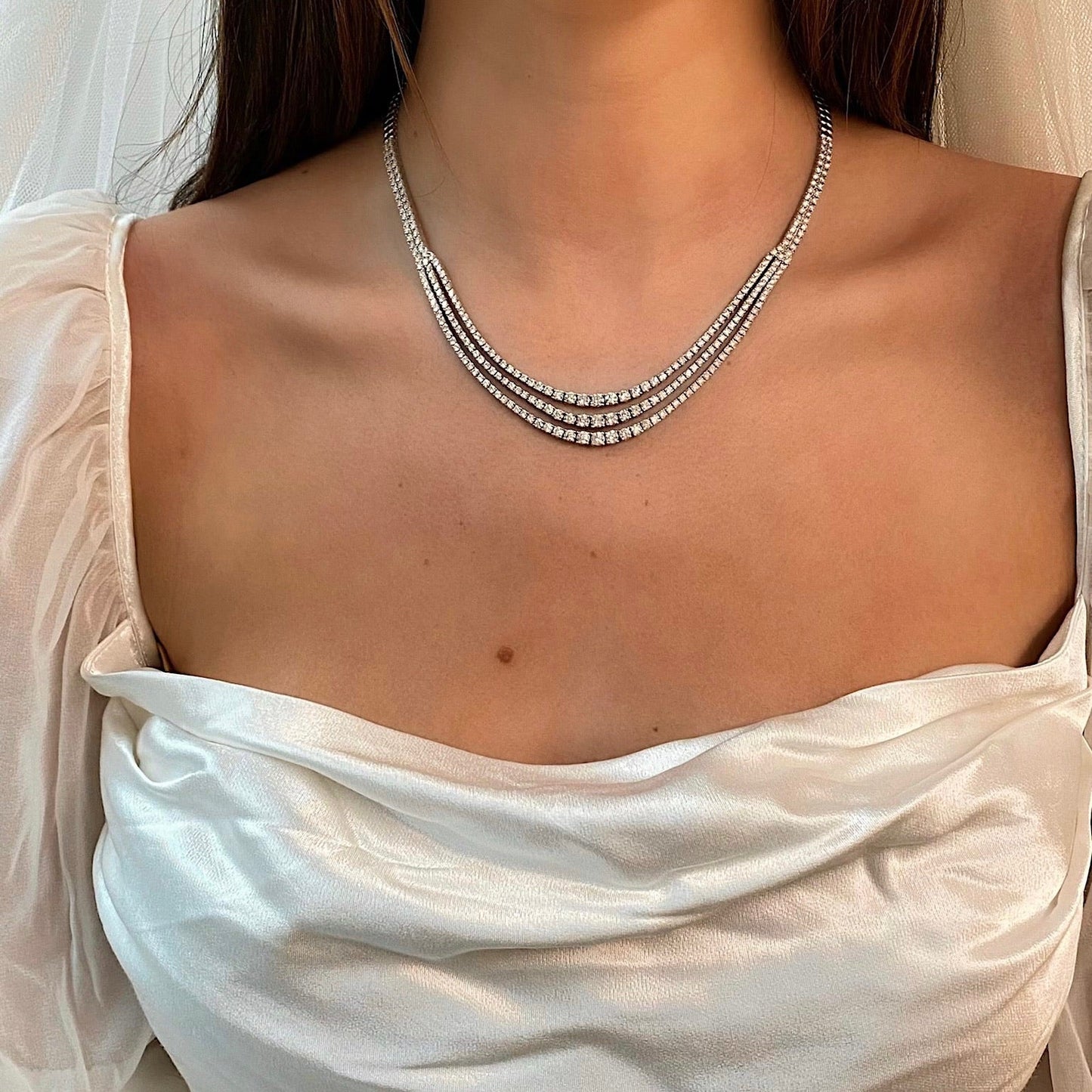 Ring Concierge Necklaces 14k White Gold Triple Row Graduated Diamond Necklace - on-model with model wearing silky white top
