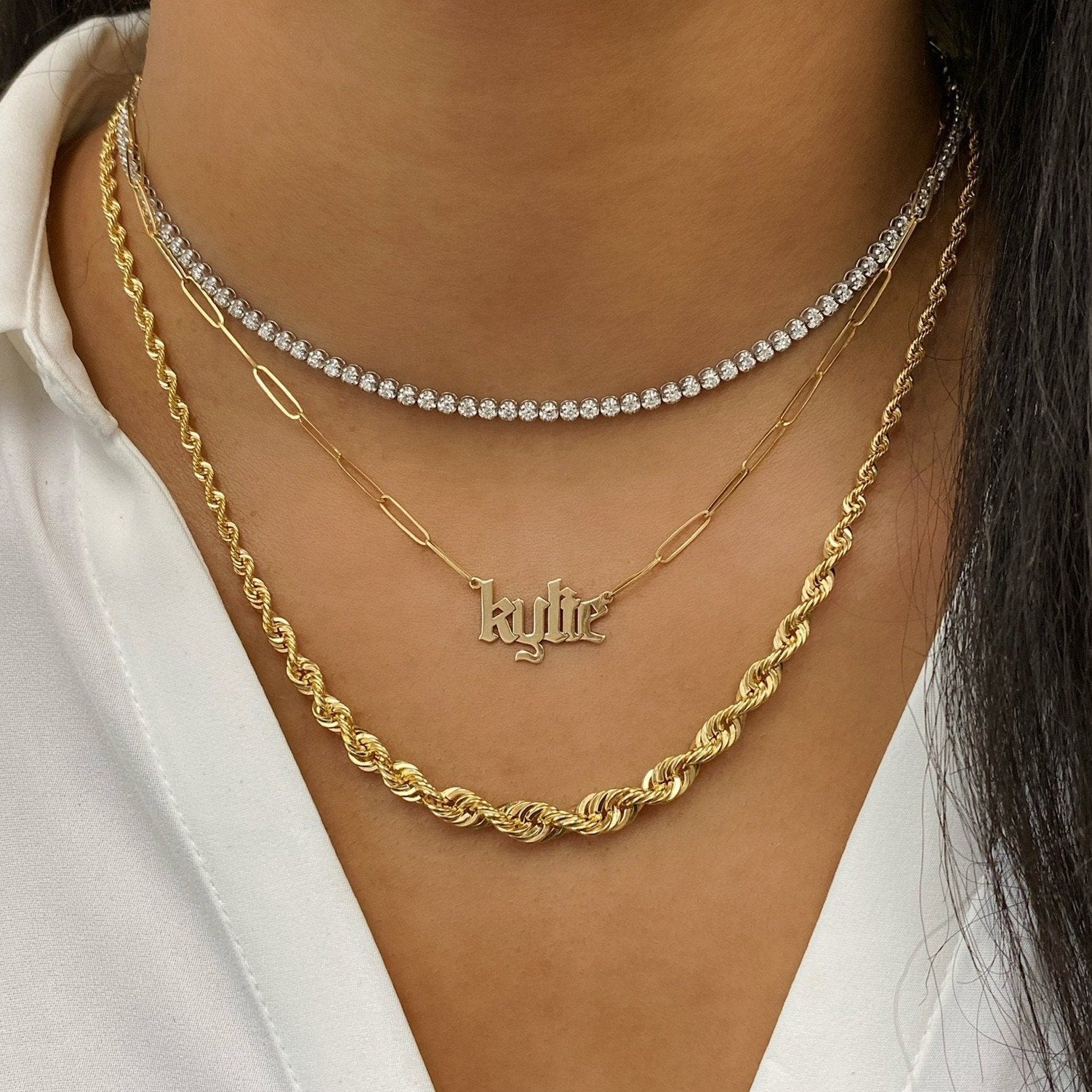 Ring Concierge Necklaces 14k Yellow Gold Personalized Gothic Name + Link Chain Necklace - name 'kylie' styled with white top and diamond tennis necklace and gold necklace