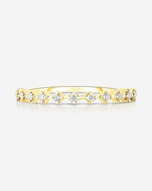 Flat lay of Ring Concierge 14k Yellow Gold Diamond Station Stackable Ring