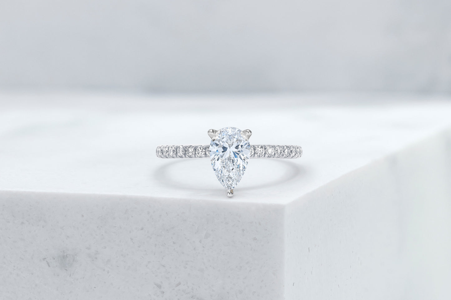 Lexington VOW by Ring Concierge pear shaped micropave engagement ring in platinum. 33281434320984 