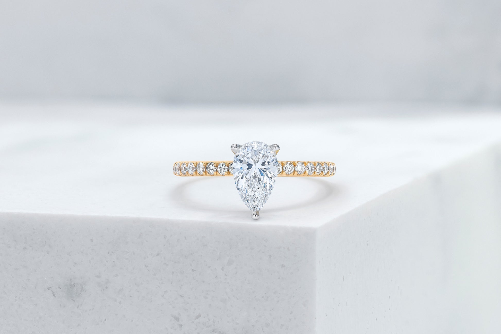 Lexington VOW by Ring Concierge pear shaped micropave engagement ring in yellow gold. 33281434189912 