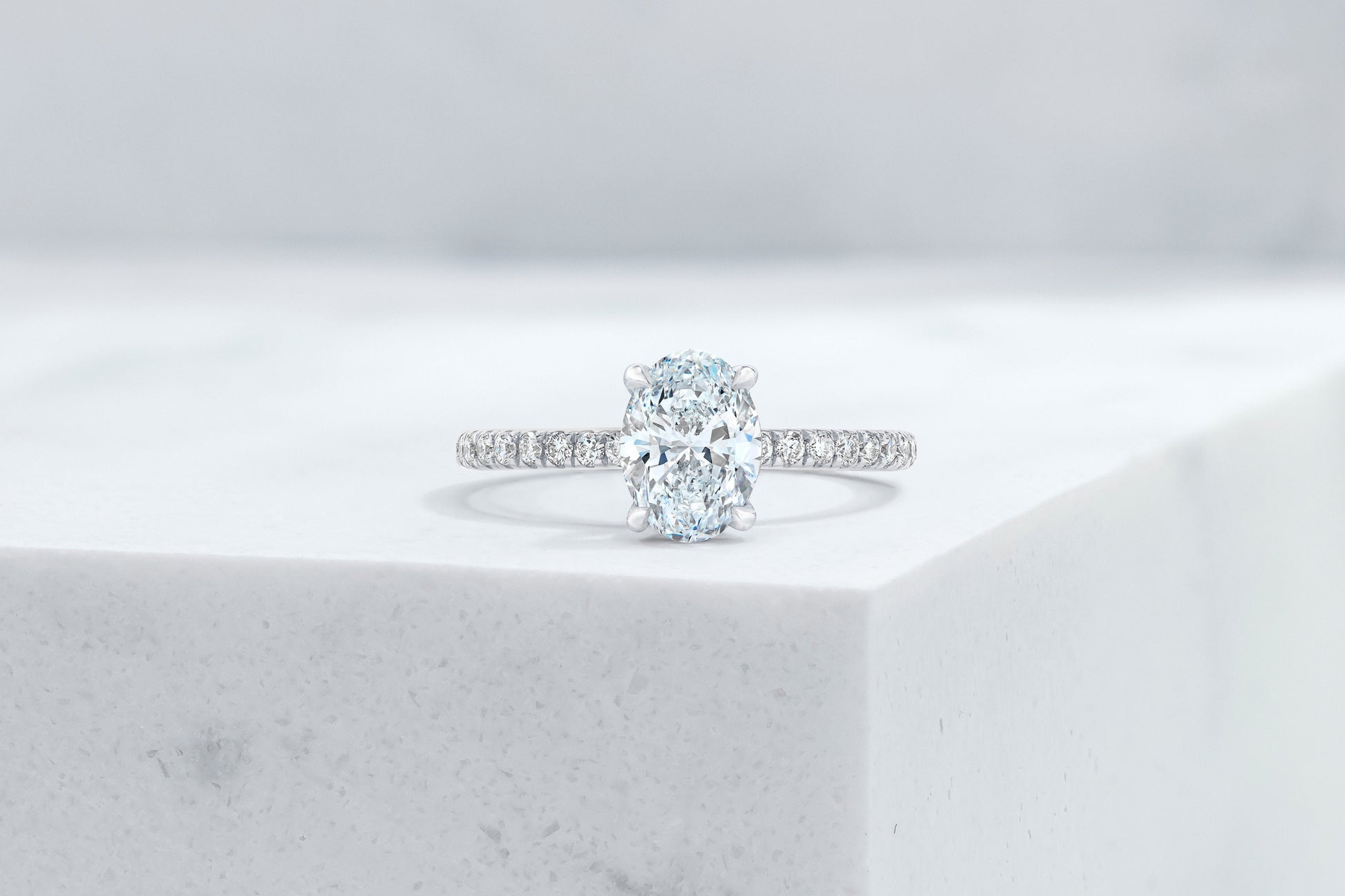 Lexington VOW by Ring Concierge oval micropave engagement ring with hidden halo in platinum. 33281433567320