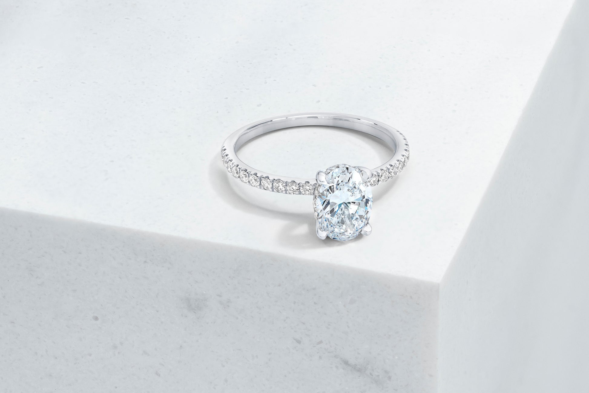 Lexington VOW by Ring Concierge oval micropave engagement ring with hidden halo in platinum. 33281433567320