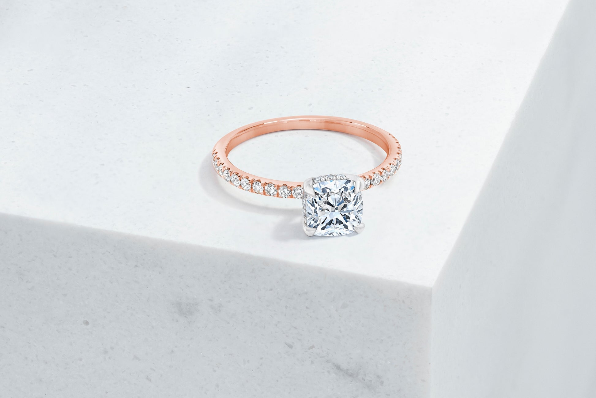 Lexington VOW by Ring Concierge cushion micropave engagement ring with hidden halo in rose gold. 33281433698392