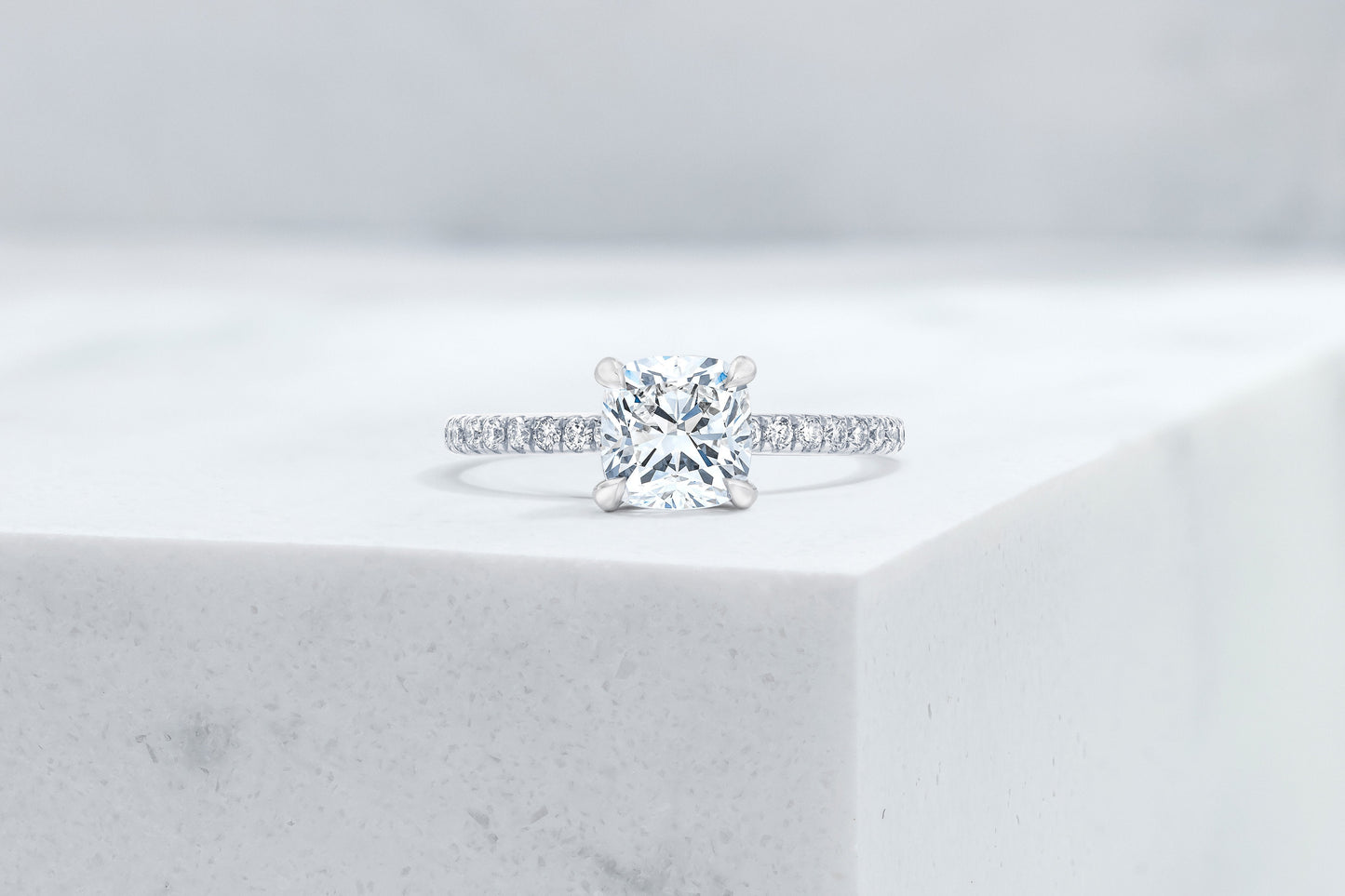 Lexington VOW by Ring Concierge cushion micropave engagement ring with hidden halo in platinum. 33281433763928