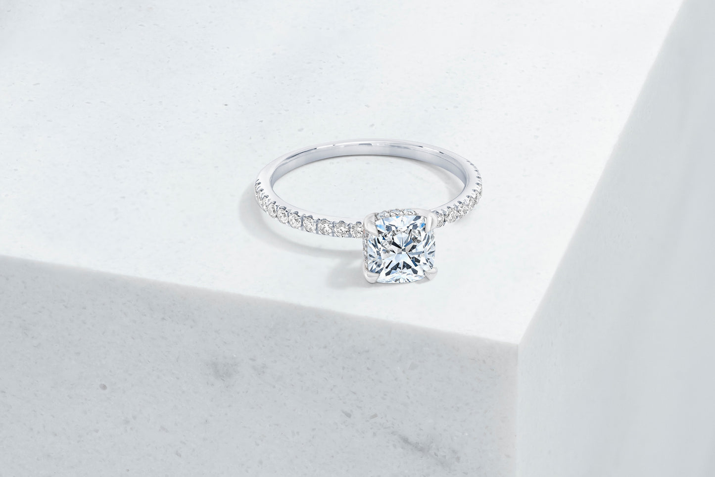 Lexington VOW by Ring Concierge cushion micropave engagement ring with hidden halo in platinum. 33281433763928
