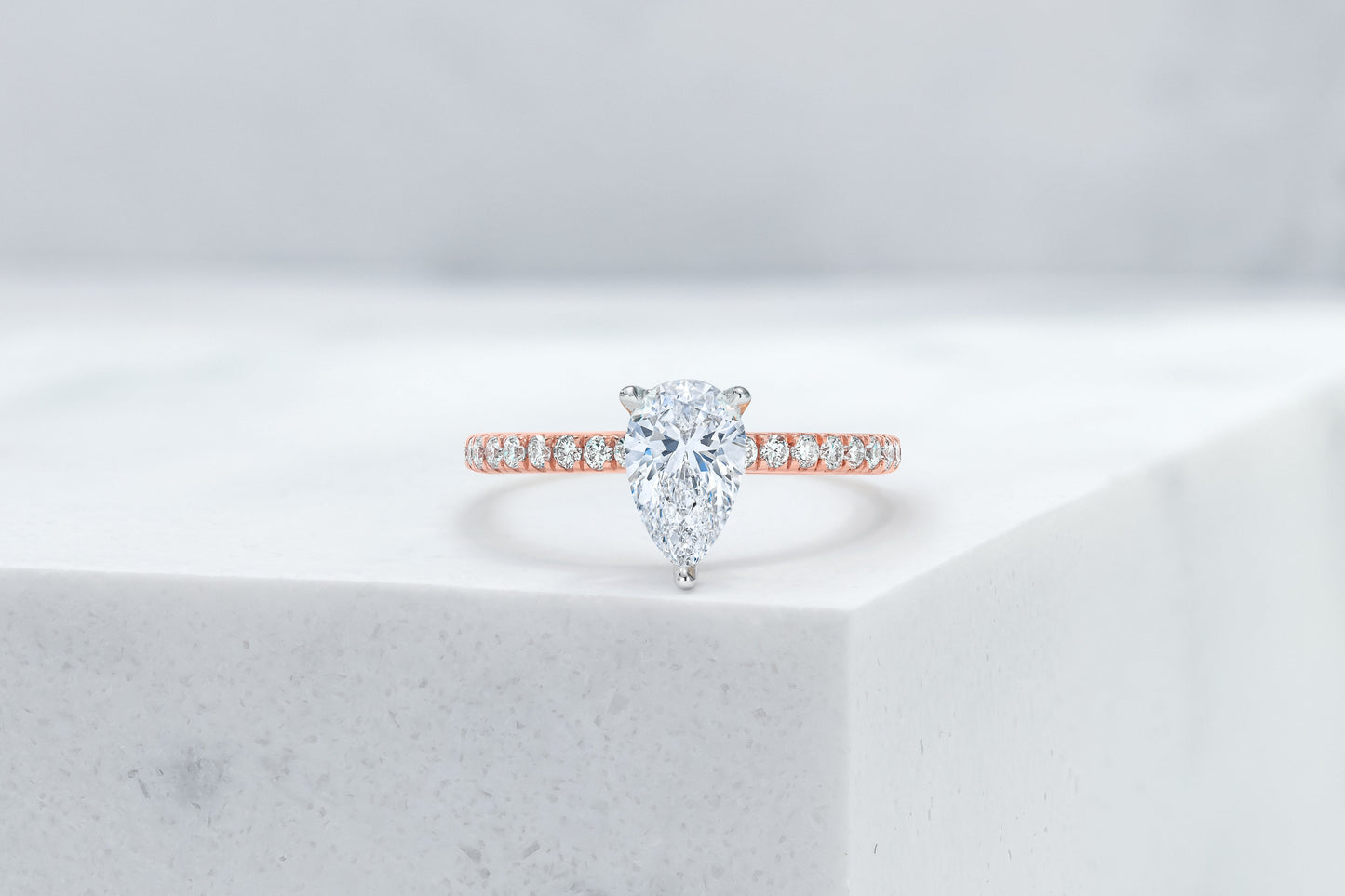 Lexington VOW by Ring Concierge pear shaped micropave engagement ring with hidden halo in rose gold. 33281434288216