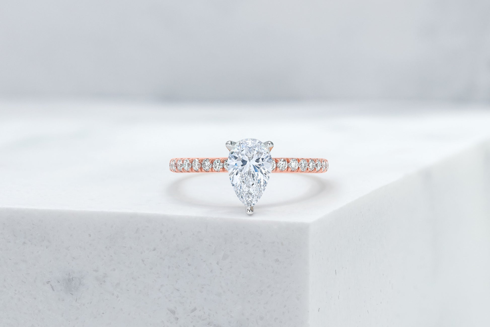 Lexington VOW by Ring Concierge pear shaped micropave engagement ring with hidden halo in rose gold. 33281434288216
