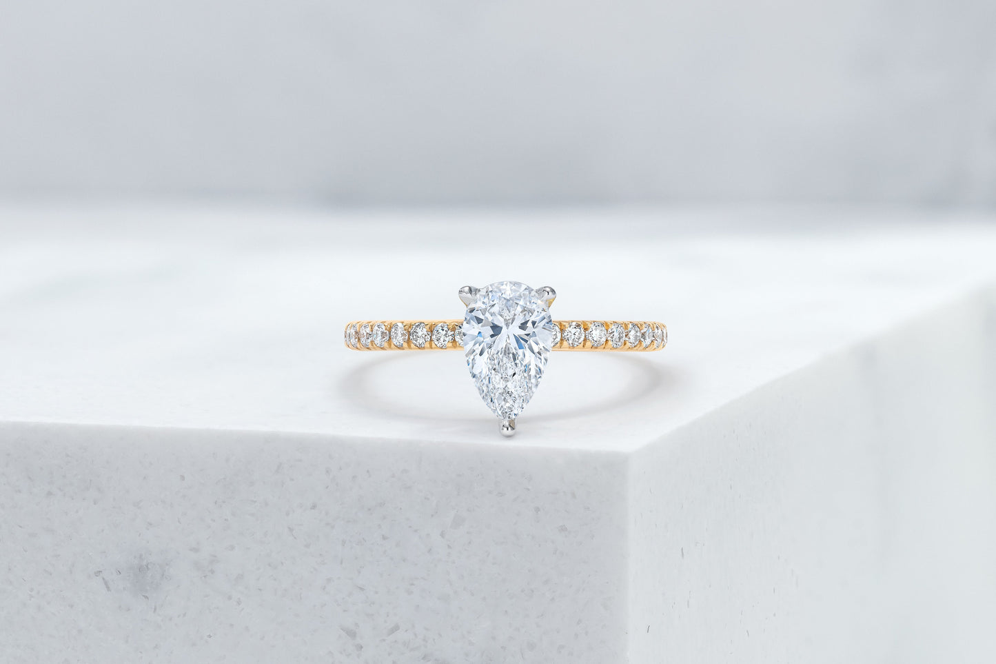 Lexington VOW by Ring Concierge pear shaped micropave engagement ring with hidden halo in yellow gold. 33281434222680