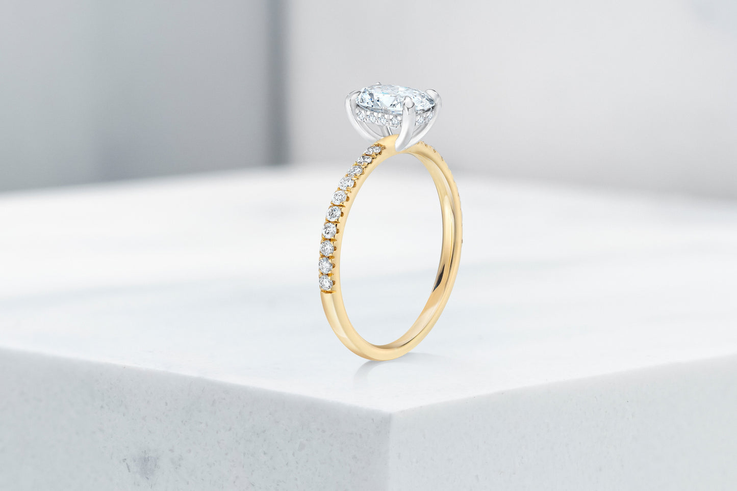 Lexington VOW by Ring Concierge oval micropave engagement ring with hidden halo in yellow gold. 33281433436248