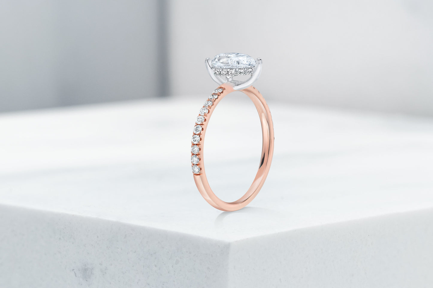 Lexington VOW by Ring Concierge pear shaped micropave engagement ring with hidden halo in rose gold. 33281434288216
